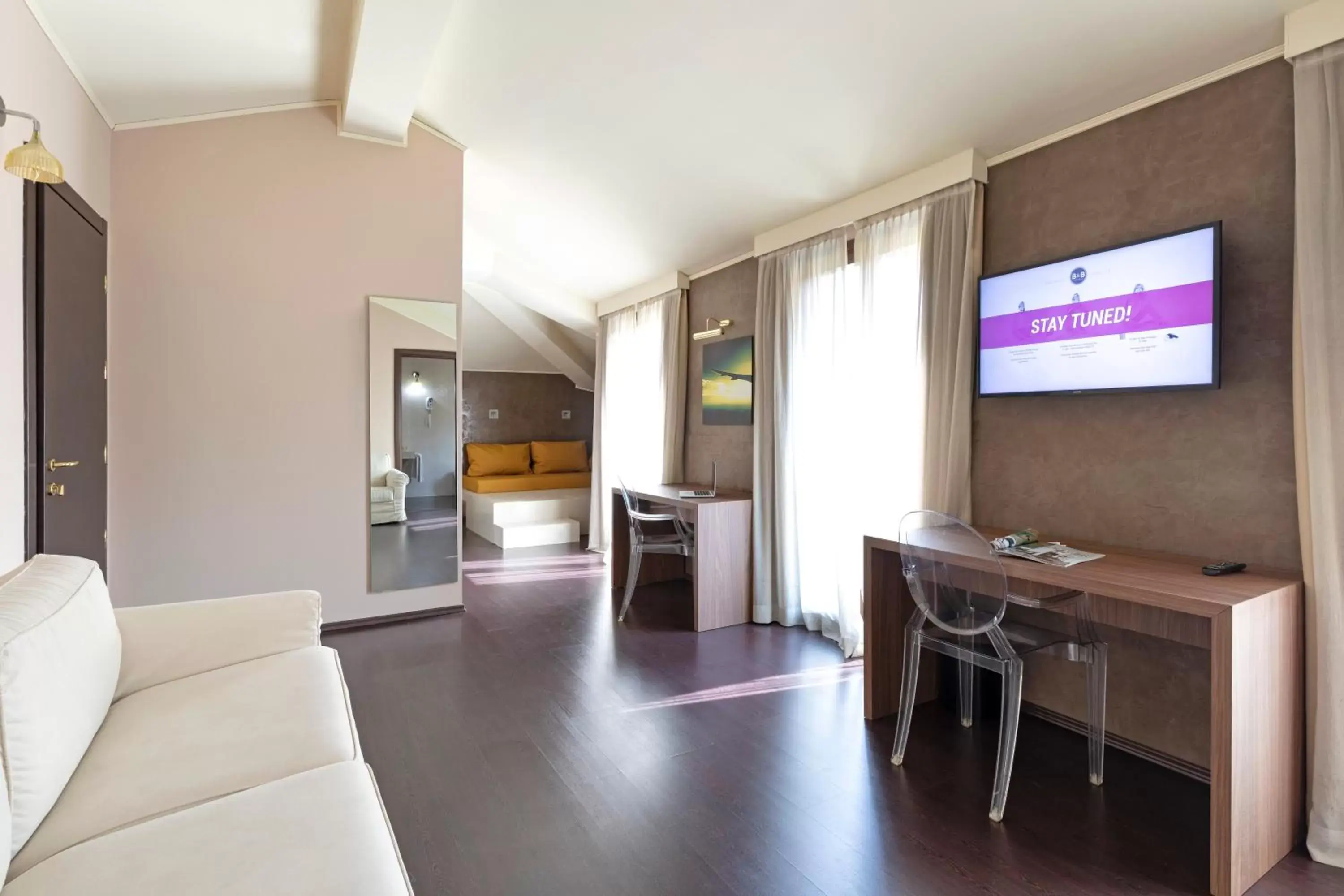 Bedroom, TV/Entertainment Center in B&B Hotel Malpensa Lago Maggiore