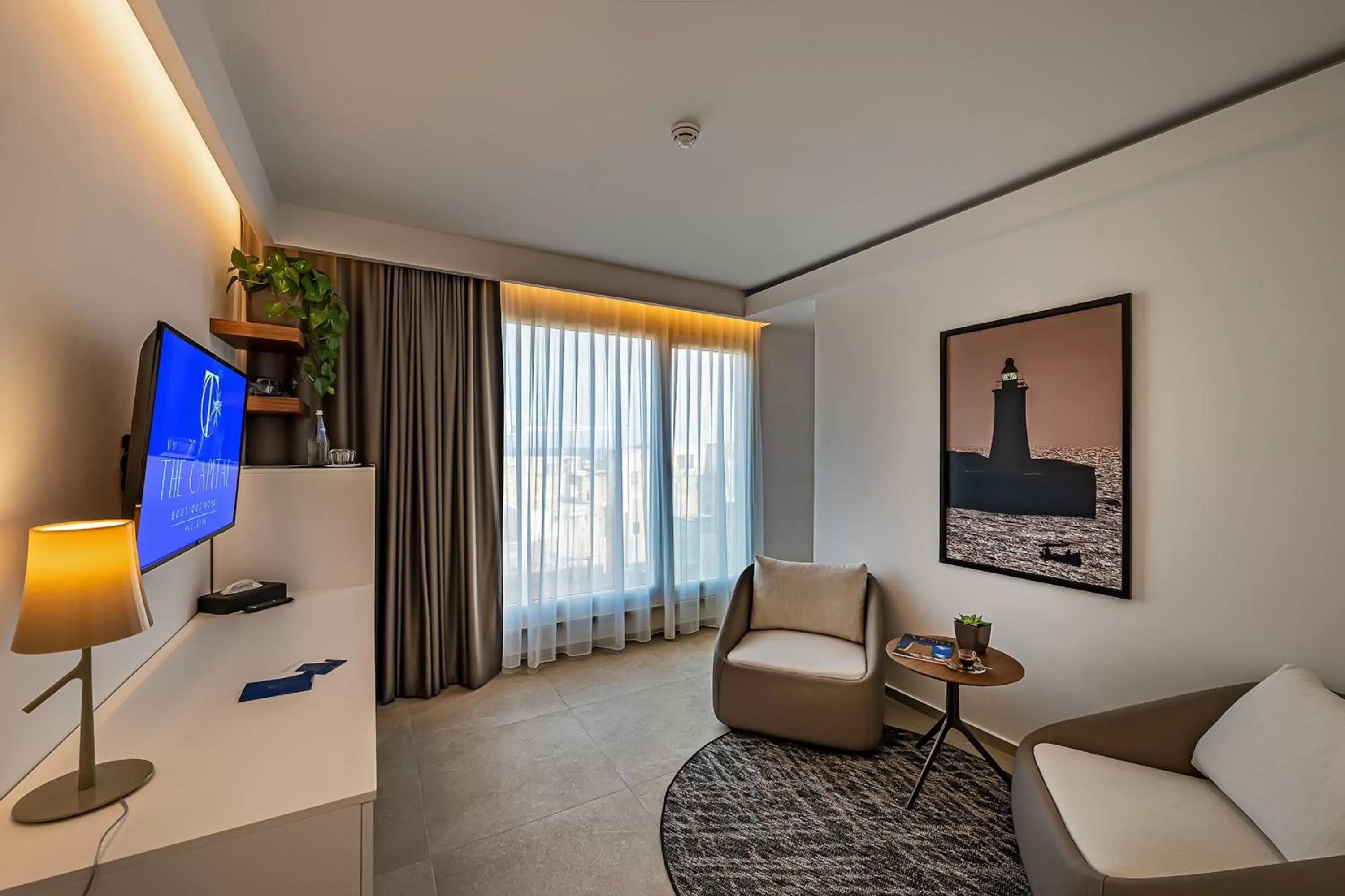 TV and multimedia in The Capital Boutique Hotel