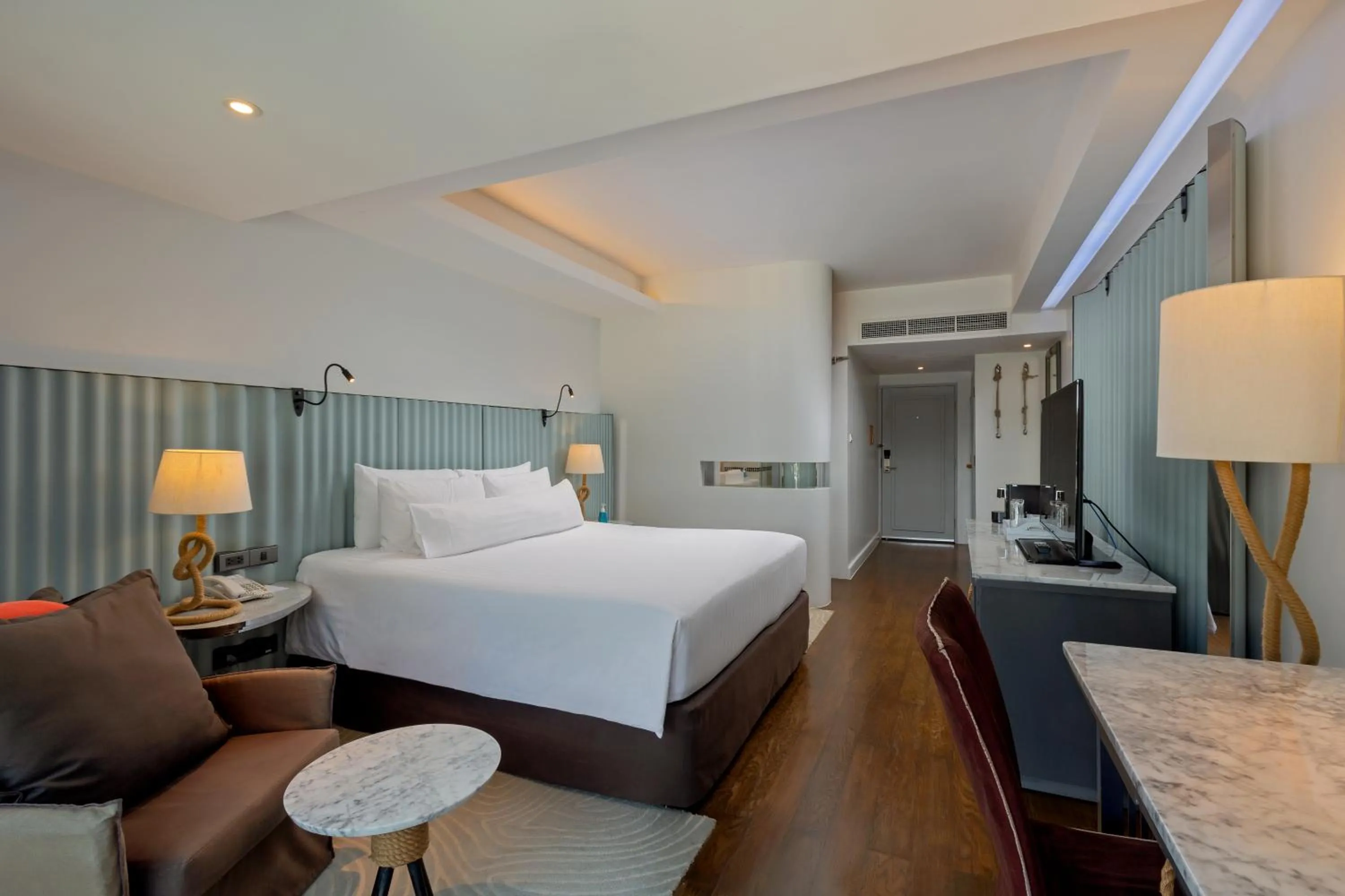 Bed in The Boathouse Phuket-SHA Plus