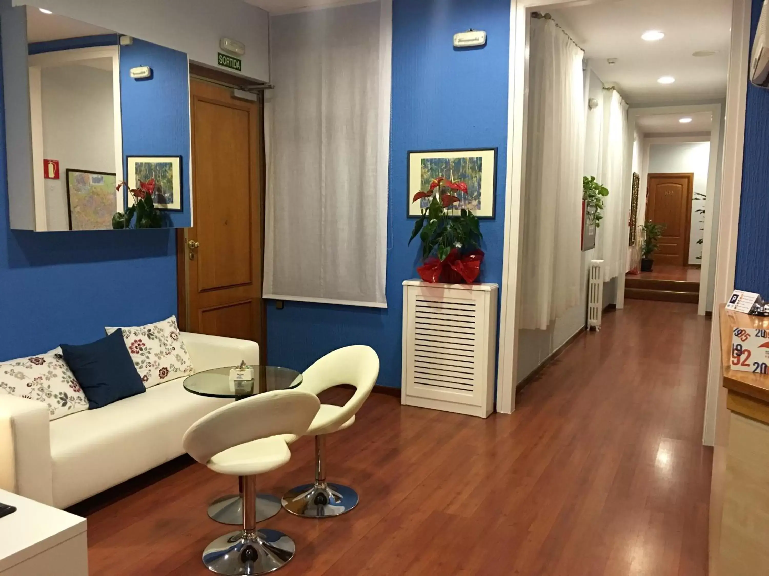 Communal lounge/ TV room, Lobby/Reception in Hotel Pelayo