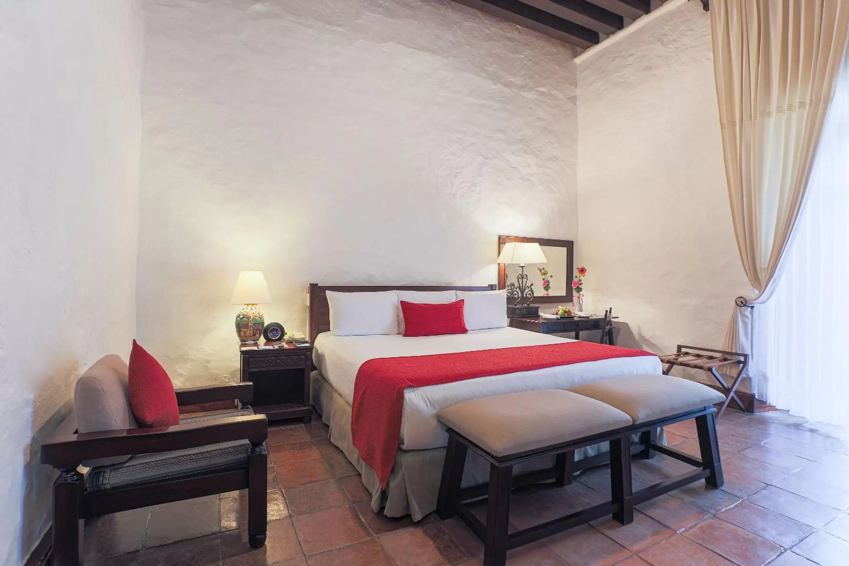 Photo of the whole room, Bed in Quinta Real Oaxaca