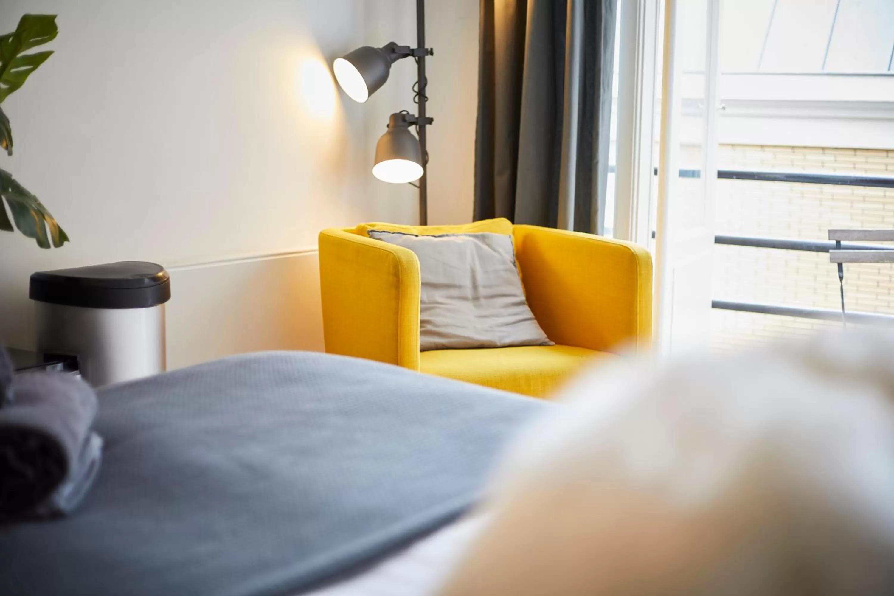 Seating area, Bed in Modern Hideout Ace Location