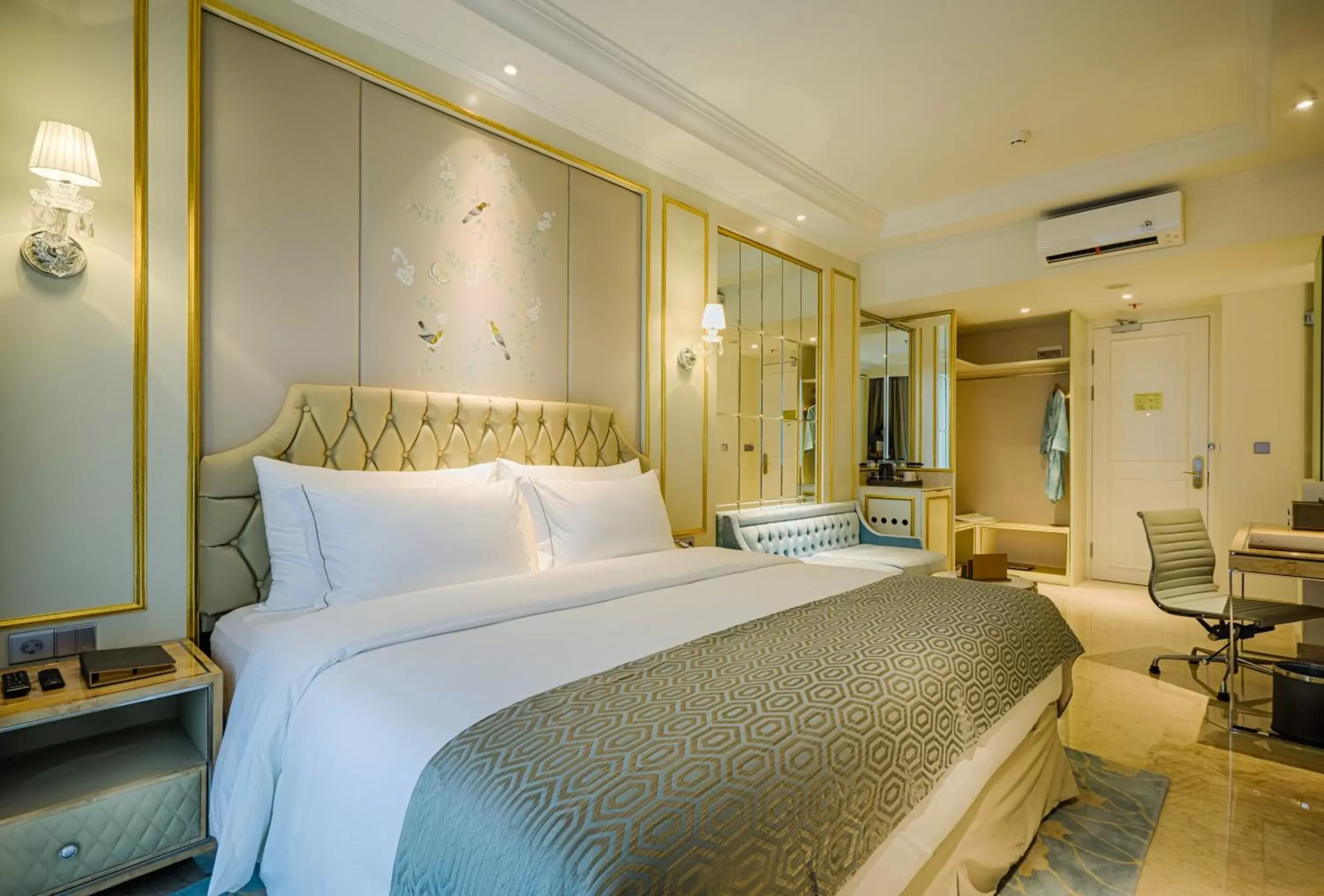 Bed in Art Deco Luxury Hotel & Residence