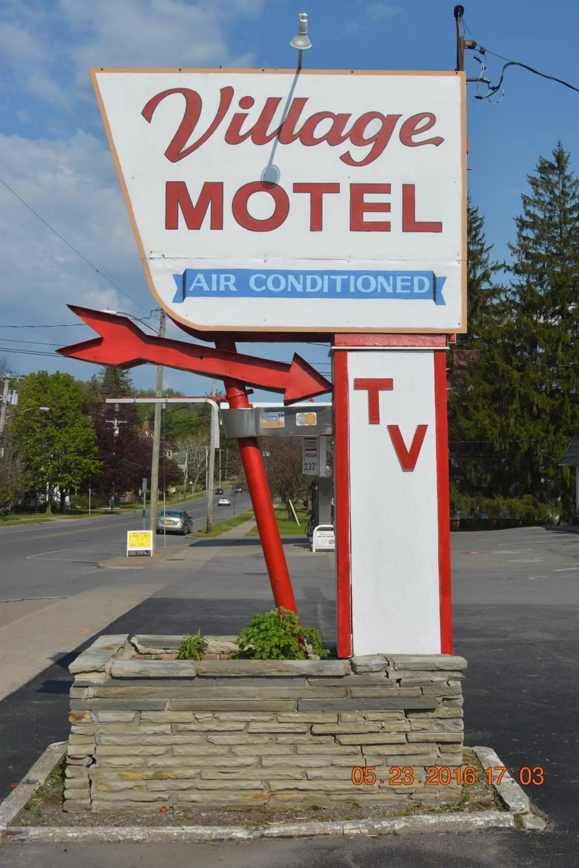 Property logo or sign in The Village Motel