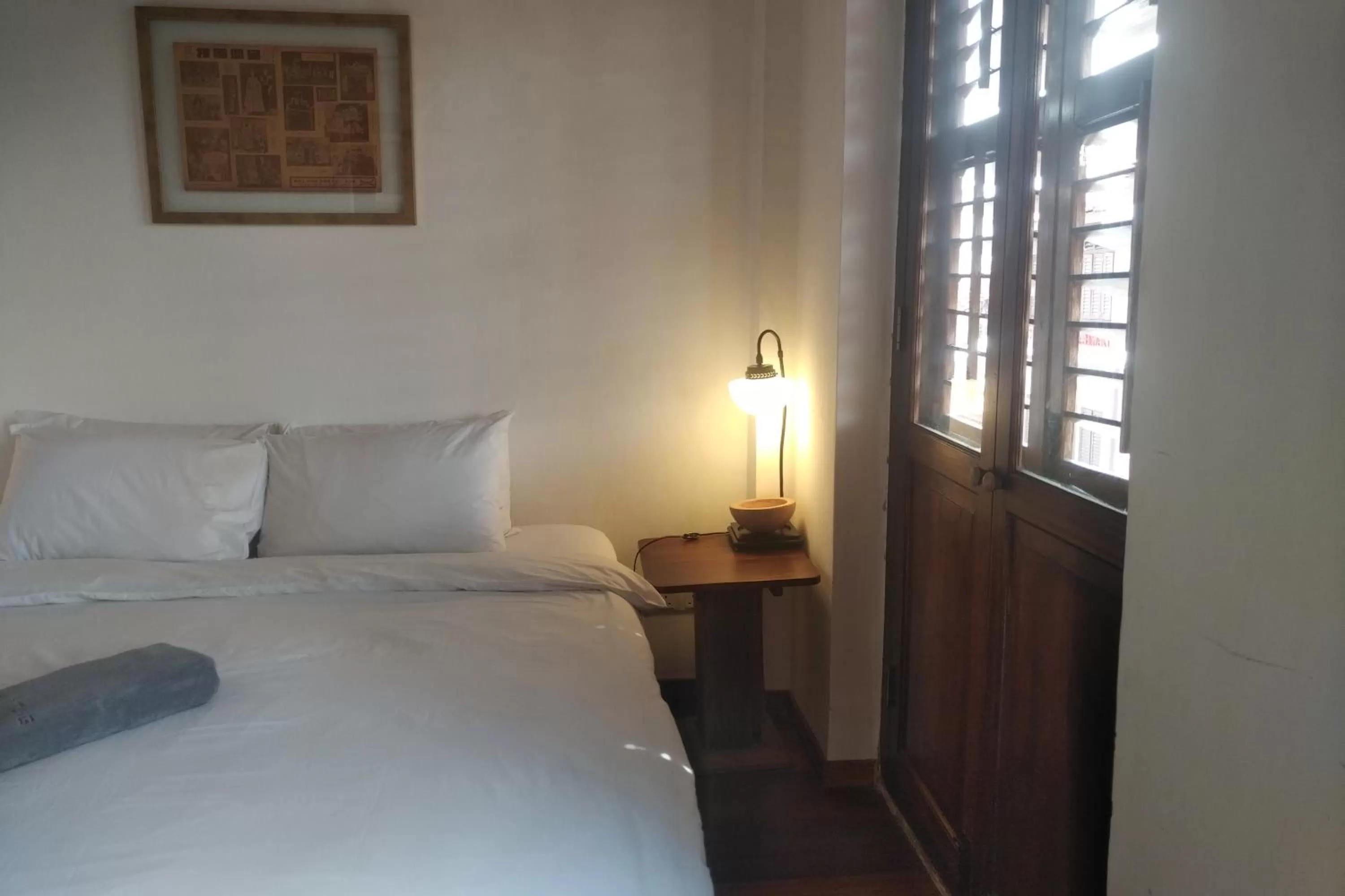 Bed in Ren I Tang Heritage Inn