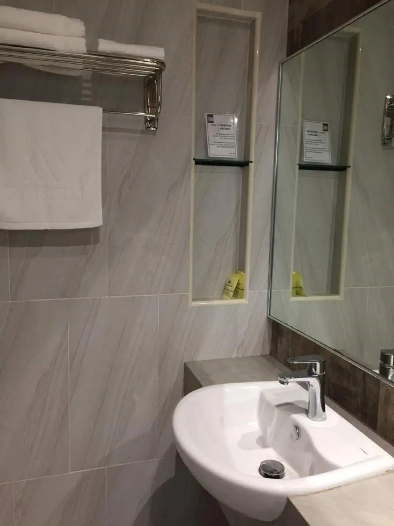 Bathroom in Meriton Inn Hotel