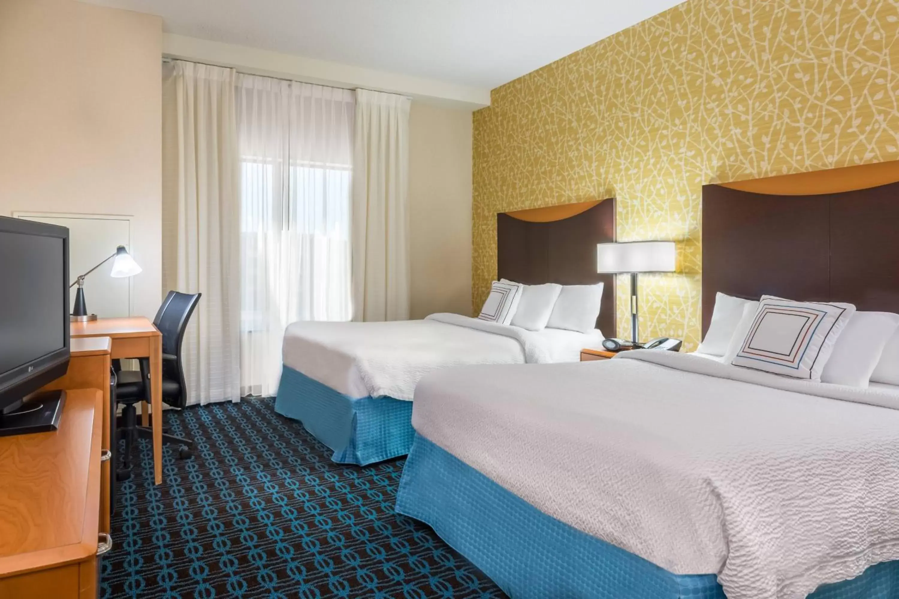 Photo of the whole room, Bed in Fairfield Inn & Suites – Buffalo Airport
