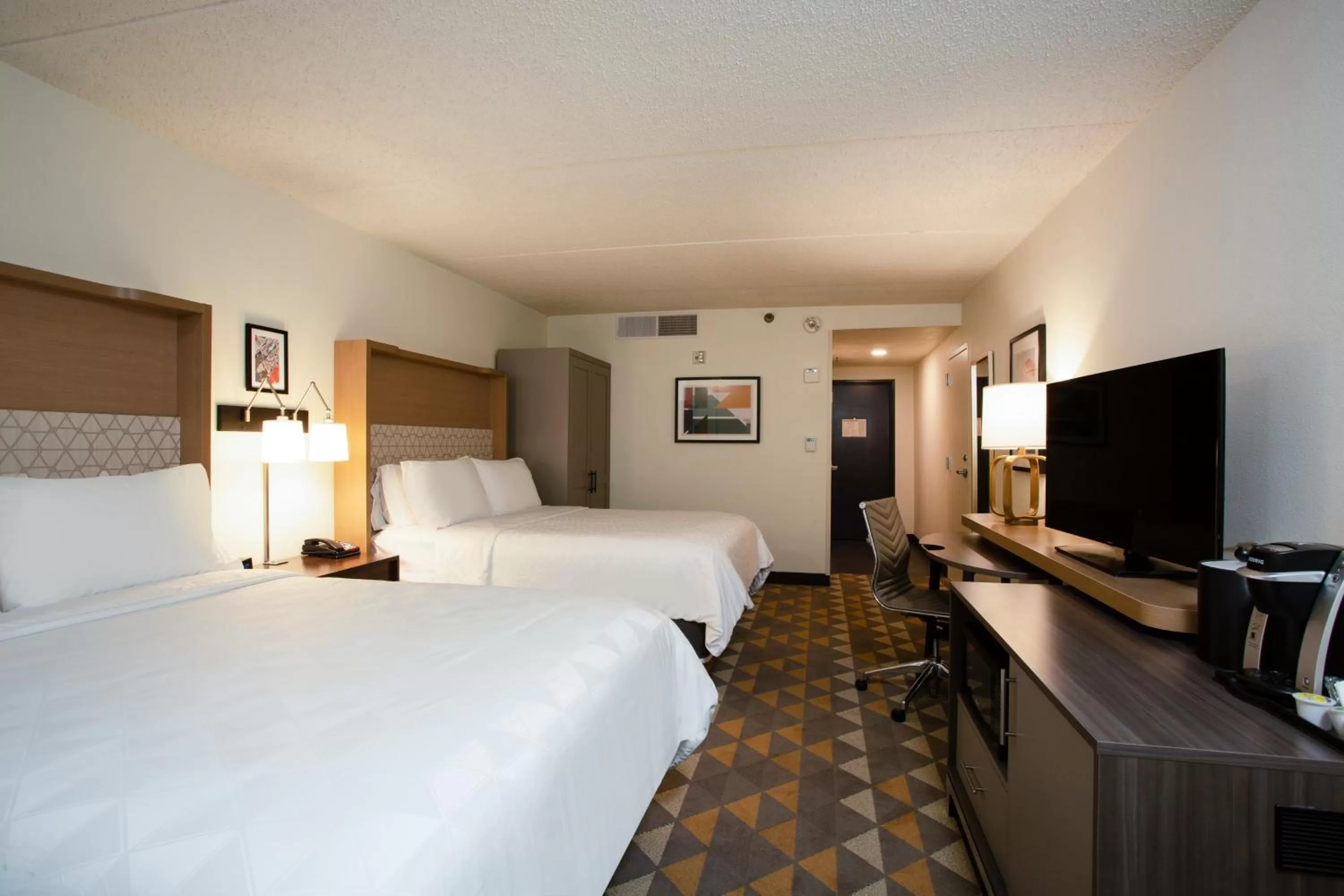 Deluxe Queen Room with Two Queen Beds and Hearing Accessible Roll-In Shower in Holiday Inn Morgantown - Reading Area, an IHG Hotel