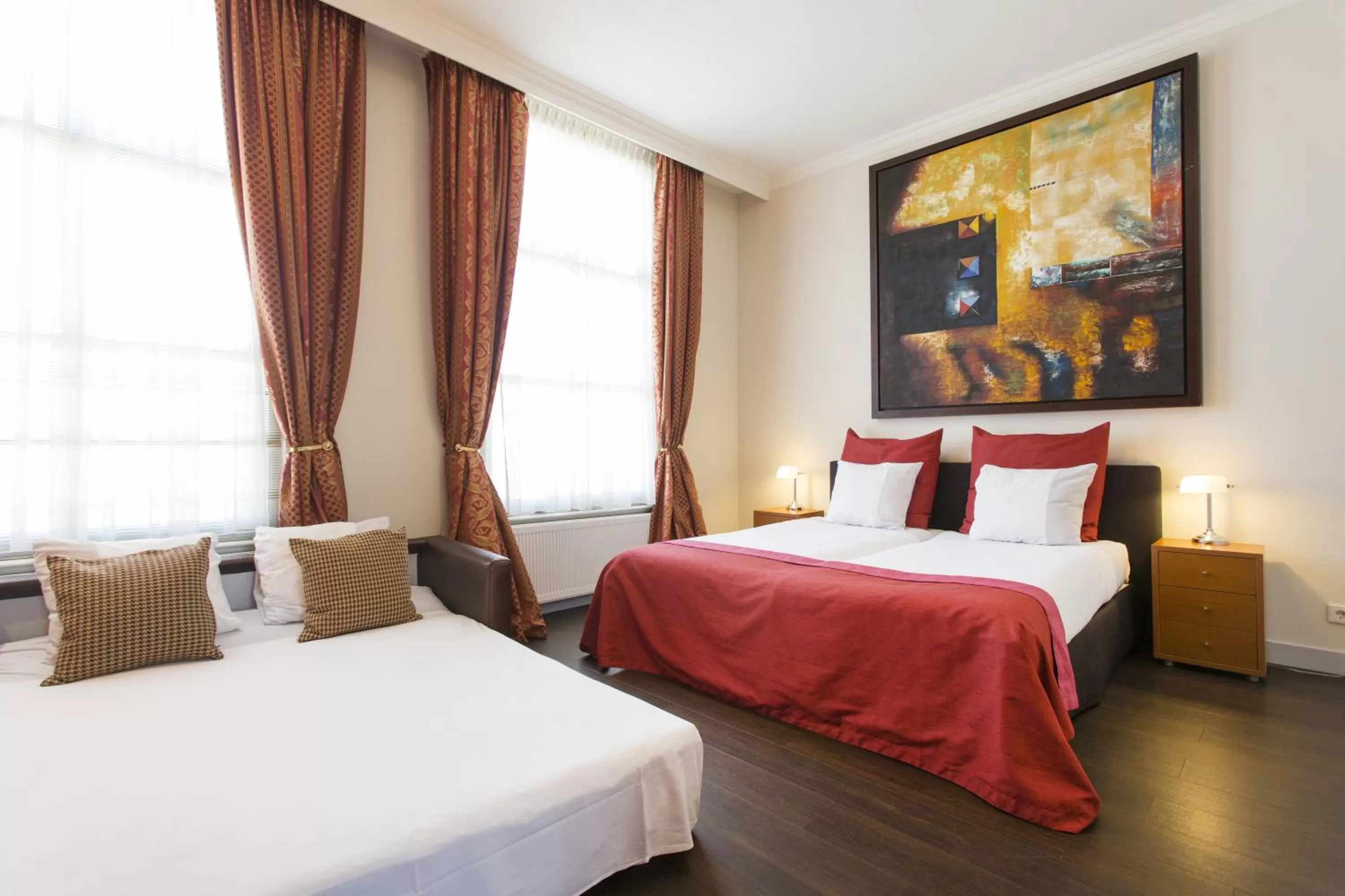 Photo of the whole room, Bed in Grand Museum Hotel, BW Signature Collection