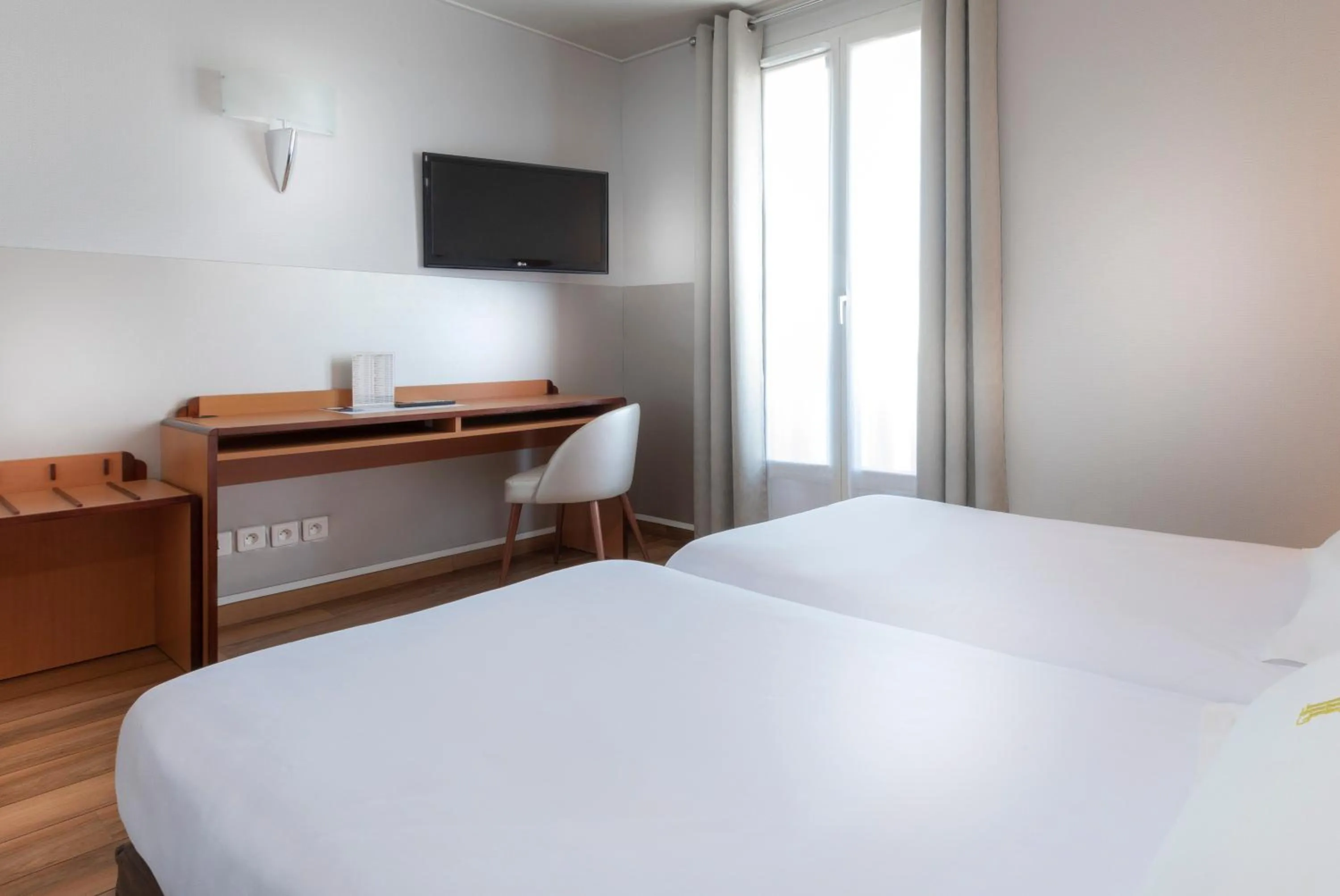 Bed in Hôtel Du Lion