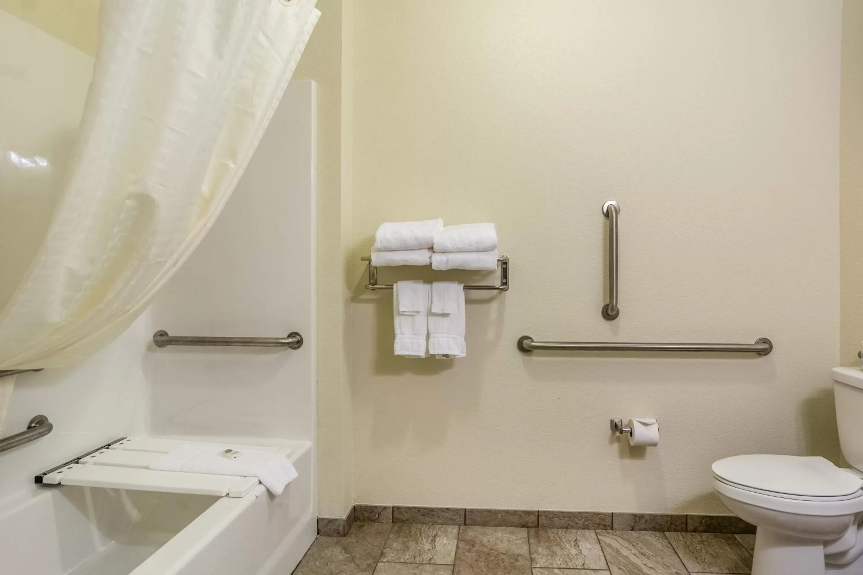 Toilet in Cobblestone Hotel & Suites - Torrington