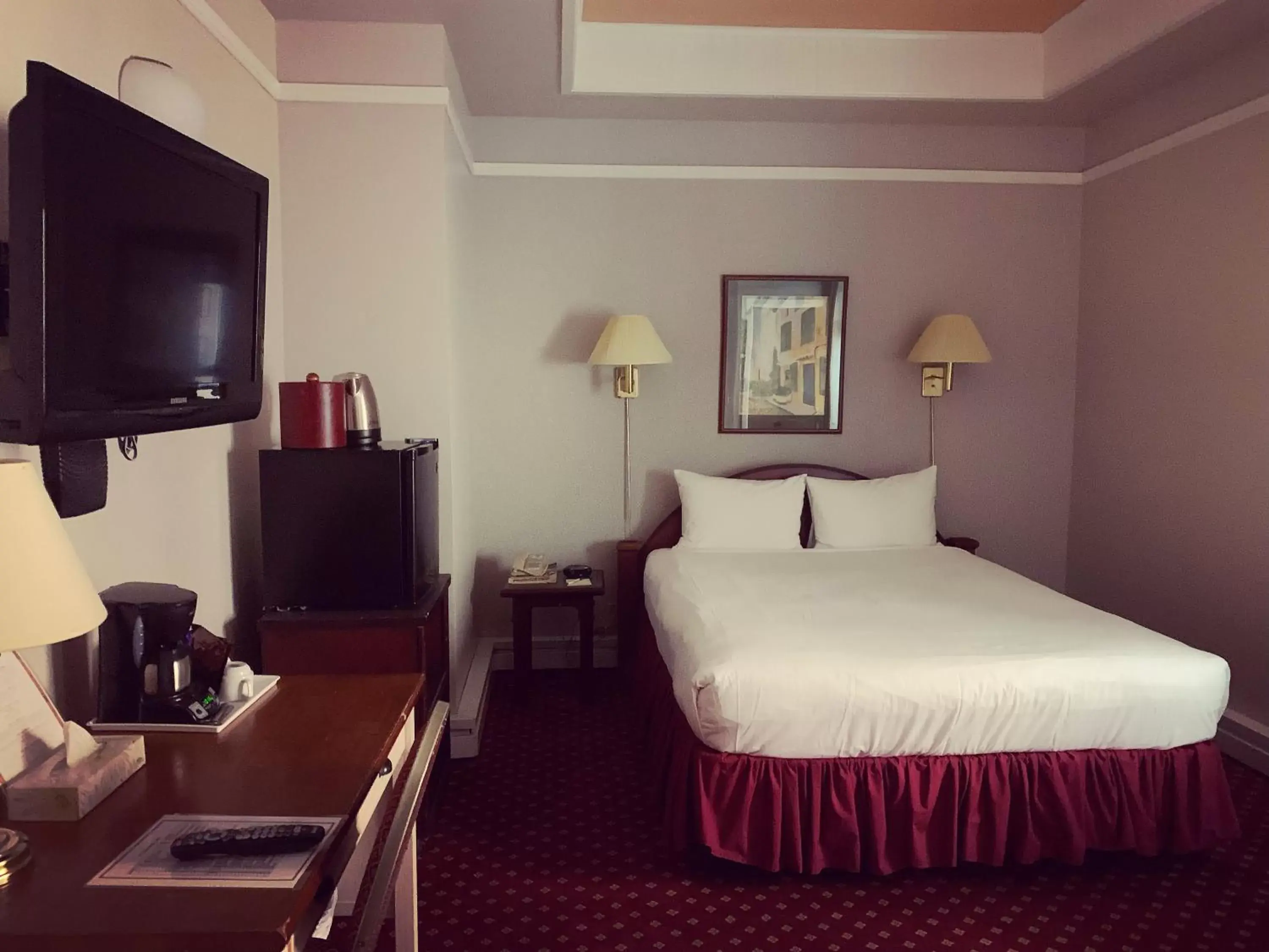 Bed in The Bedford Regency Hotel