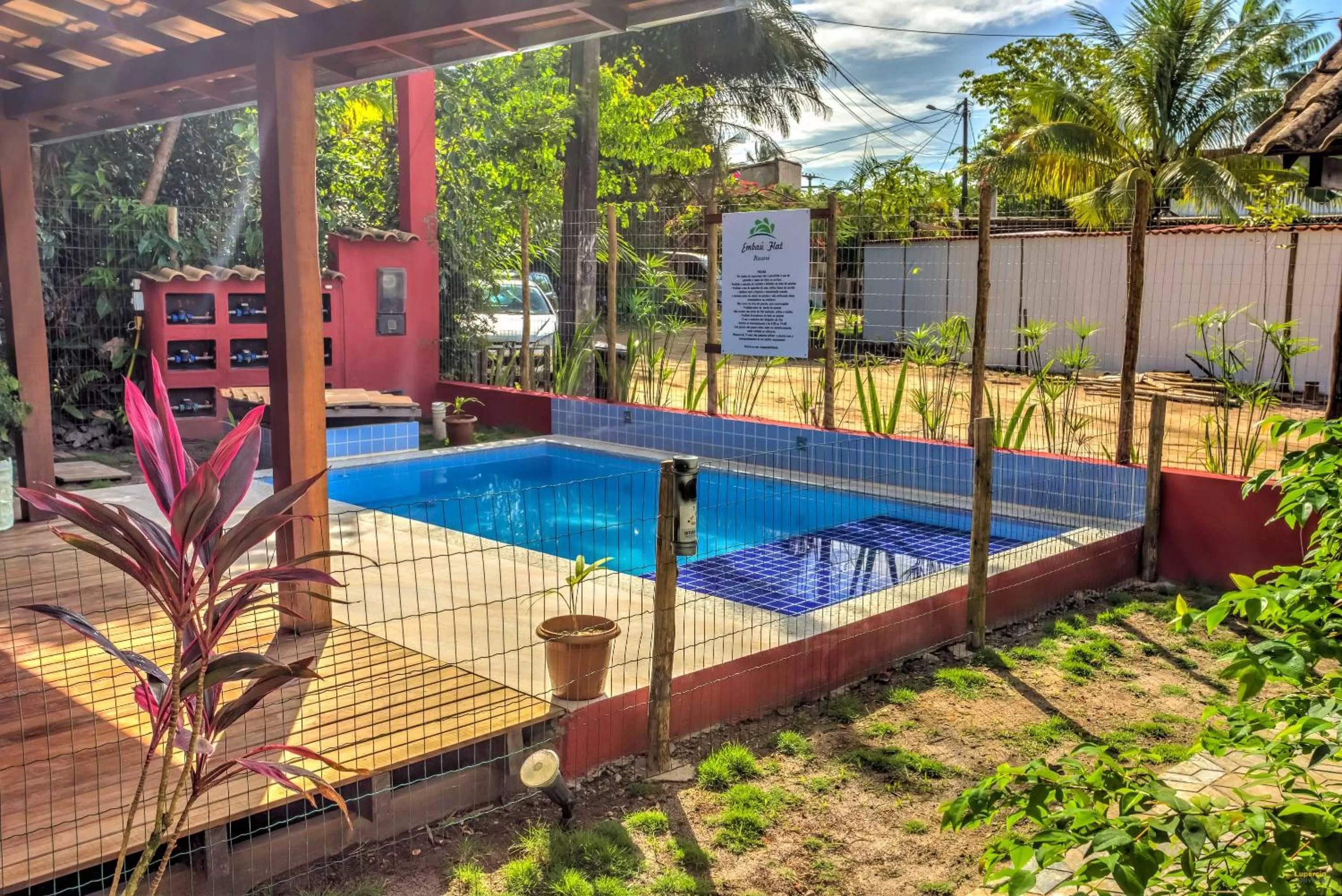 Swimming pool in i9 Embaú Flats & Suites