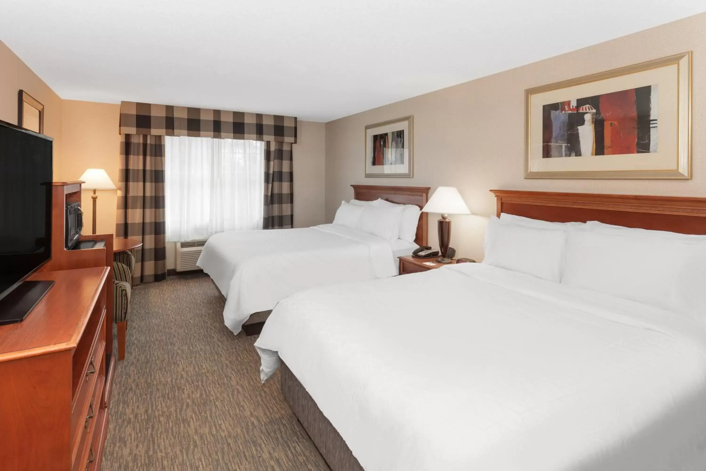 Photo of the whole room, Bed in Holiday Inn Express Hotel & Suites Hampton South-Seabrook, an IHG Hotel