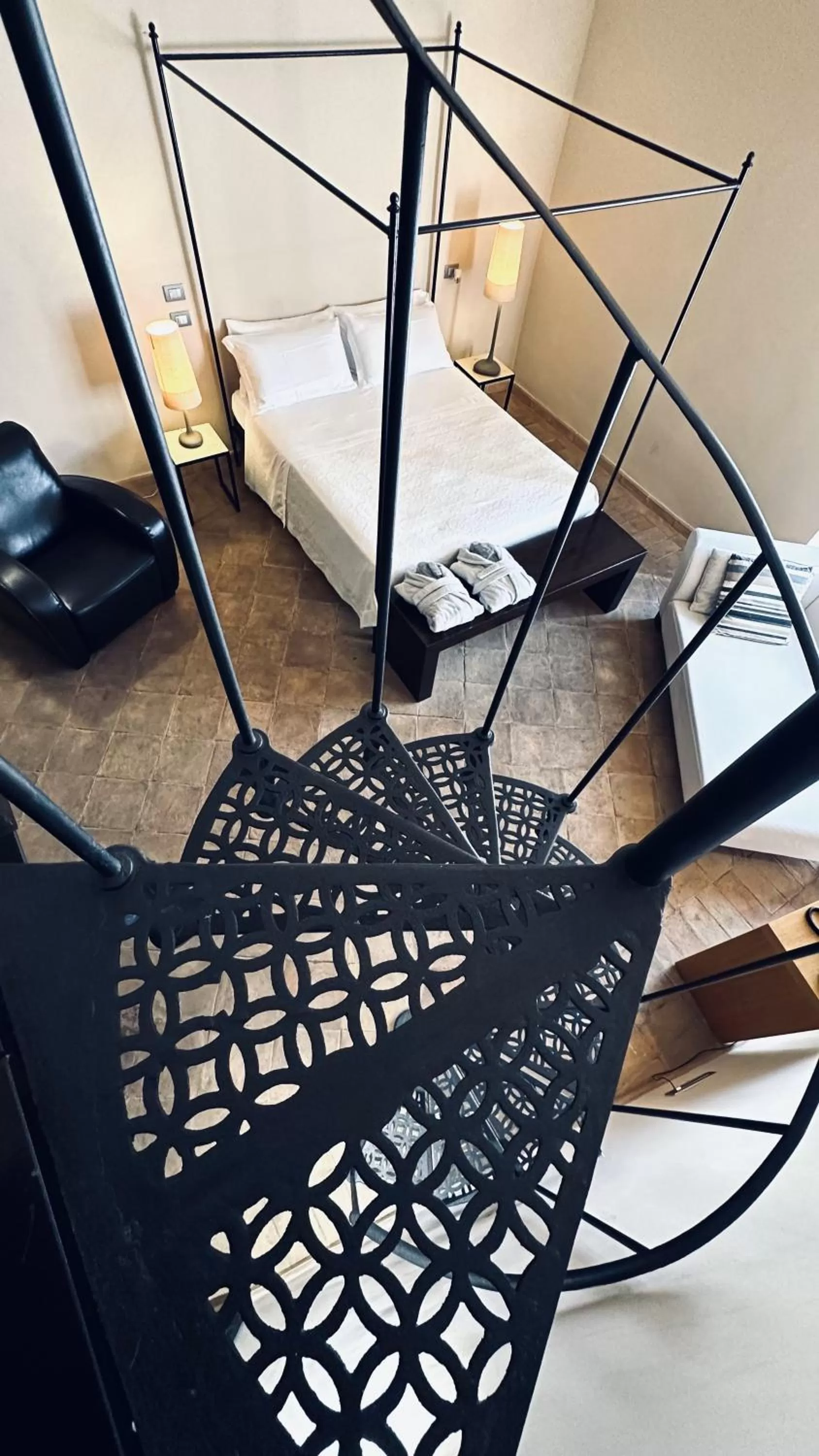 Bed in Hotel Palazzo Piccolomini