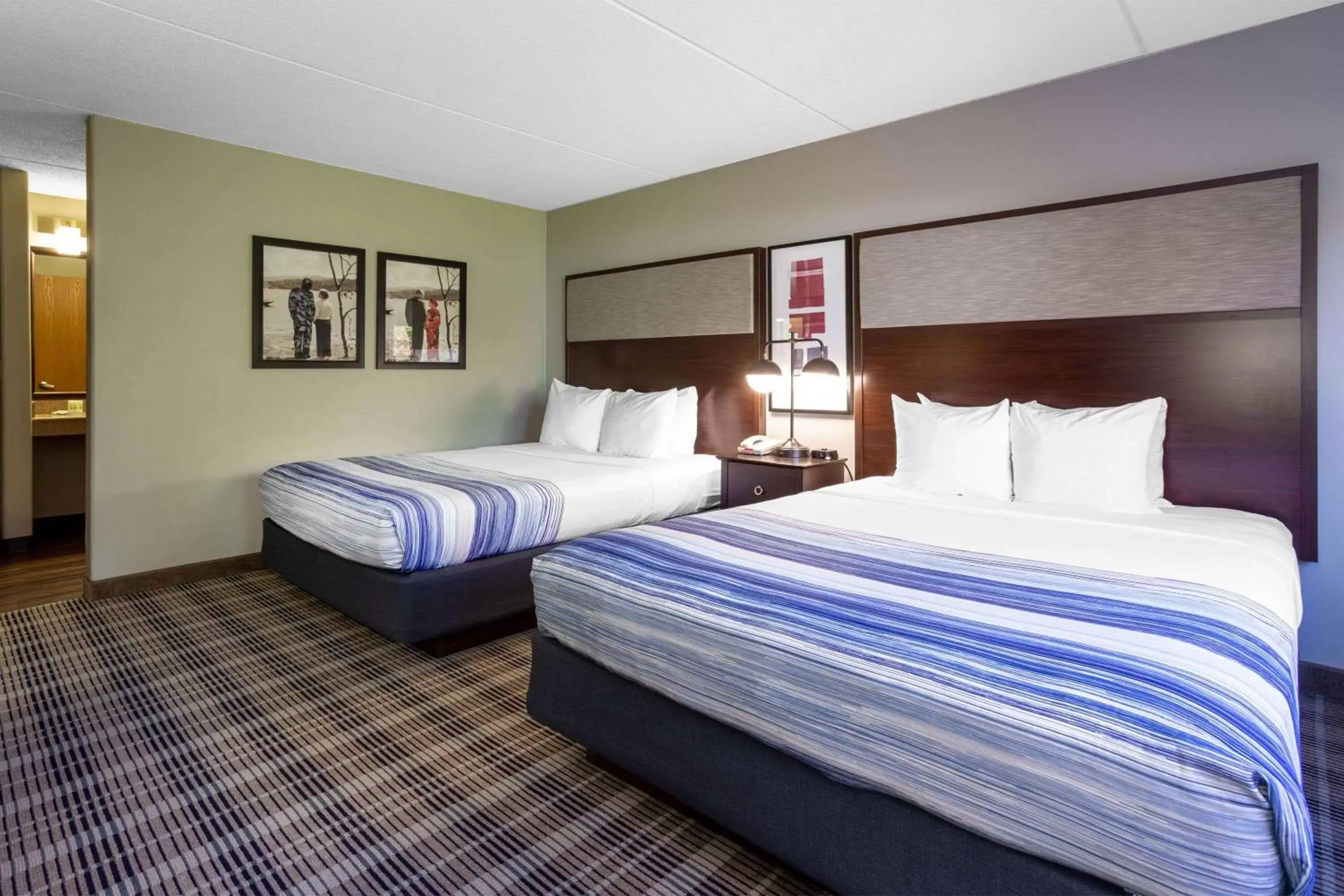 Photo of the whole room, Bed in AmericInn by Wyndham Madison South