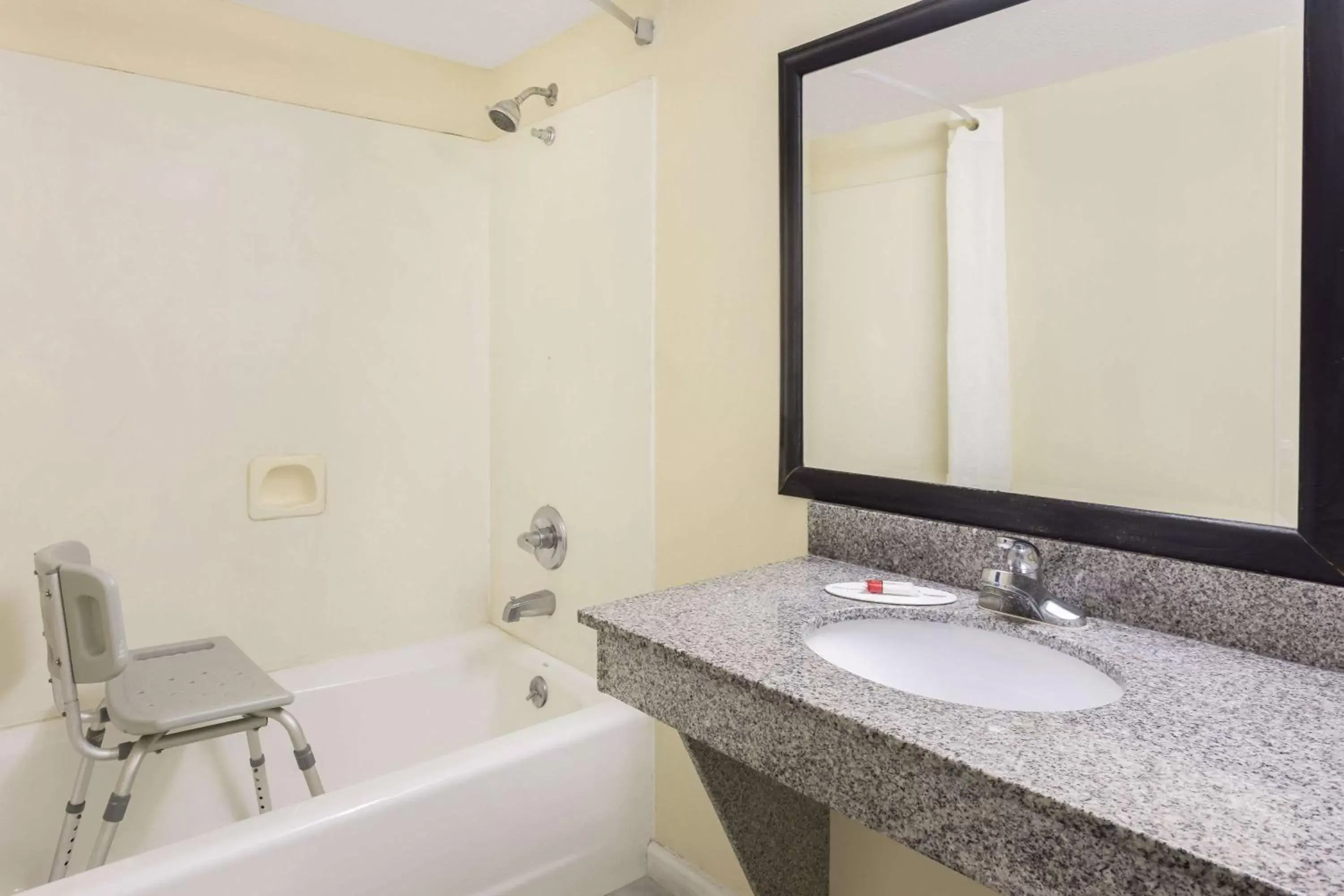 Bathroom in Super 8 by Wyndham Decatur/Lithonia/Atl Area