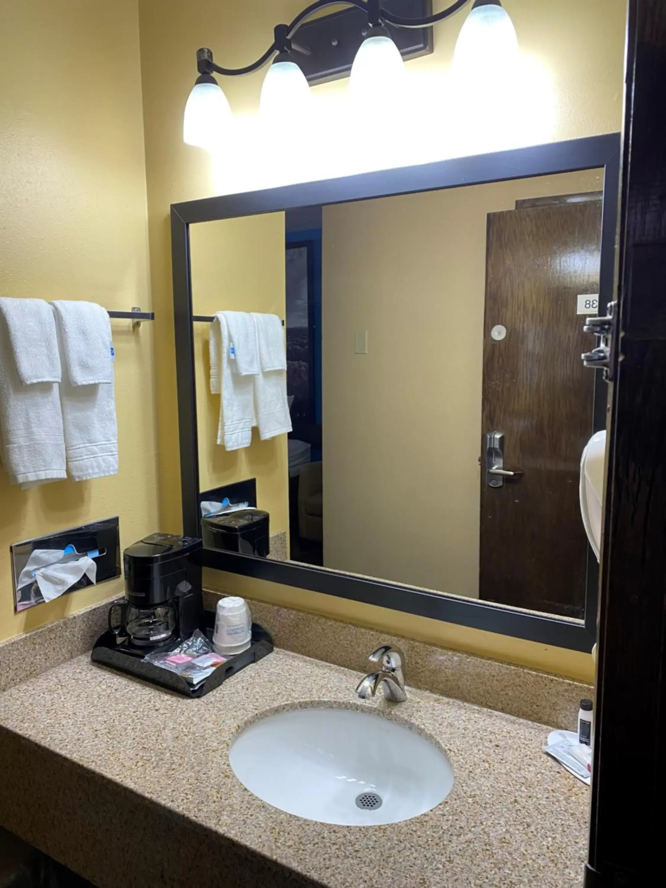 Bathroom in Super 8 by Wyndham Rochester Mayo Clinic Area