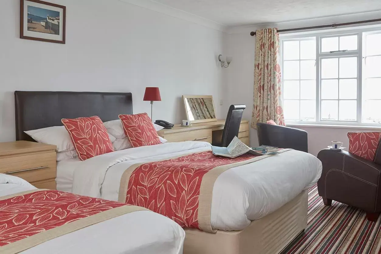 Bed in Luccombe Manor Country House Hotel