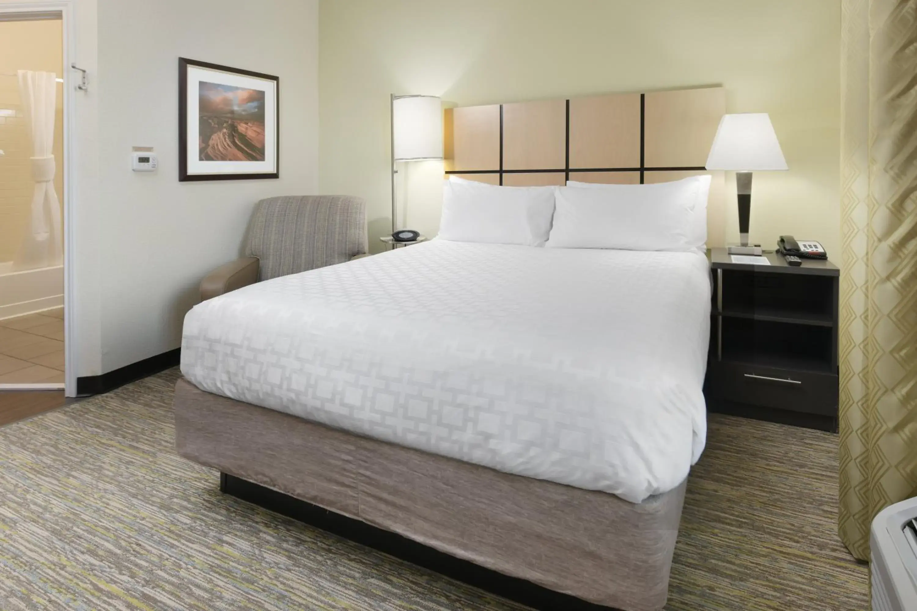 Photo of the whole room, Bed in Candlewood Suites Odessa, an IHG Hotel