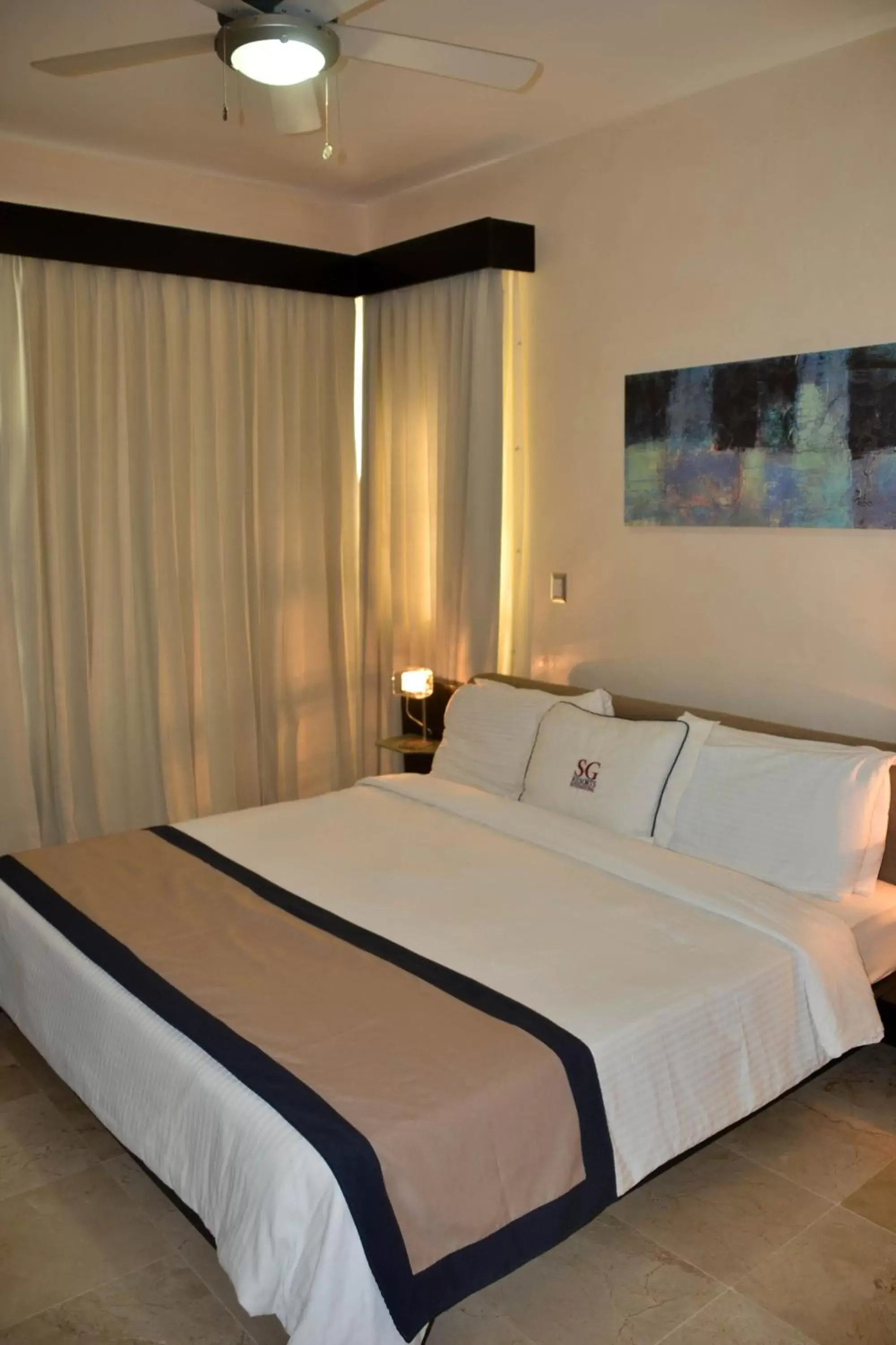 Bed in Watermark Luxury Oceanfront Residences