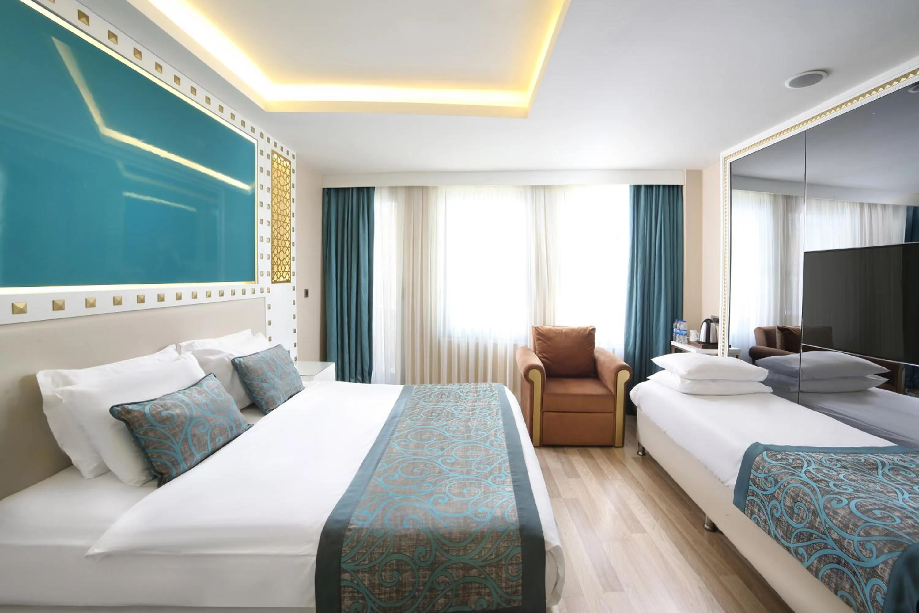 Bed in Great Fortune Hotel & Spa