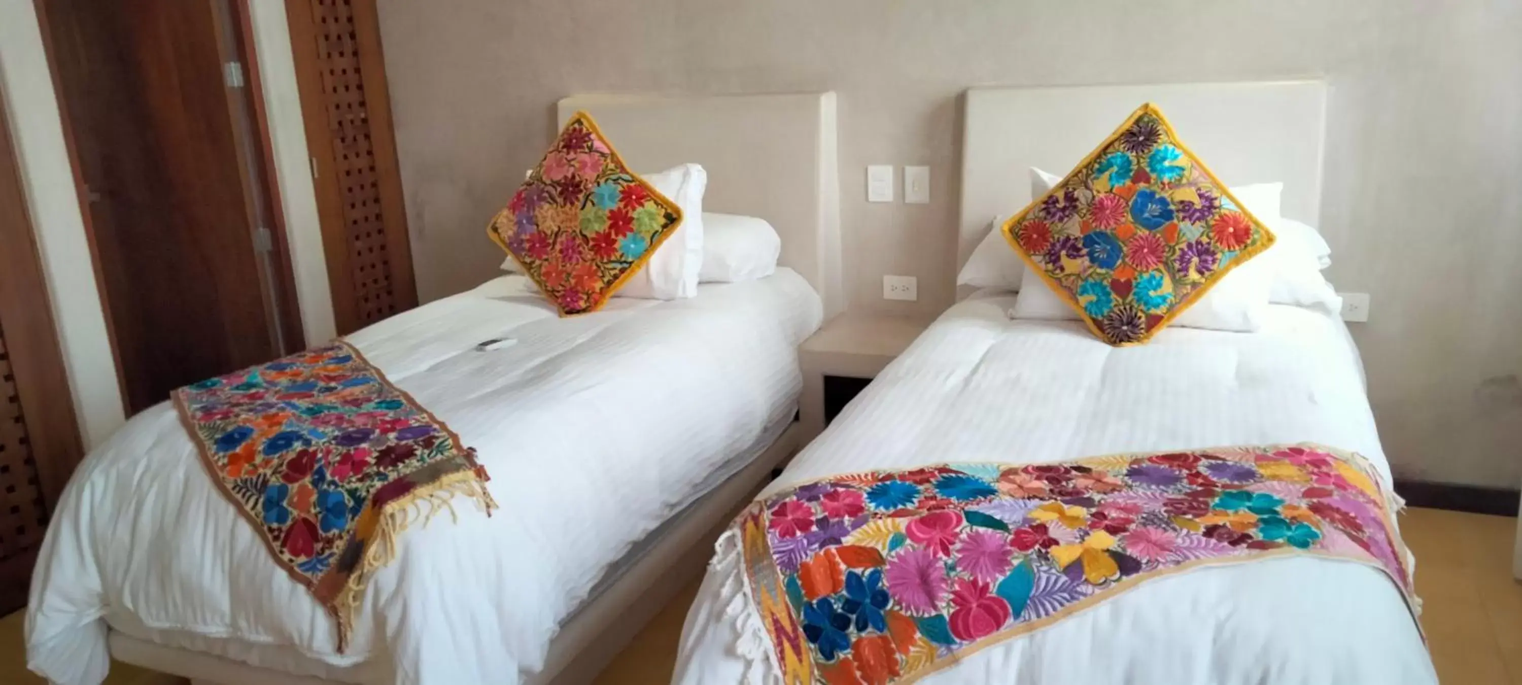 Bed in Niwa Tulum Luxury Suites