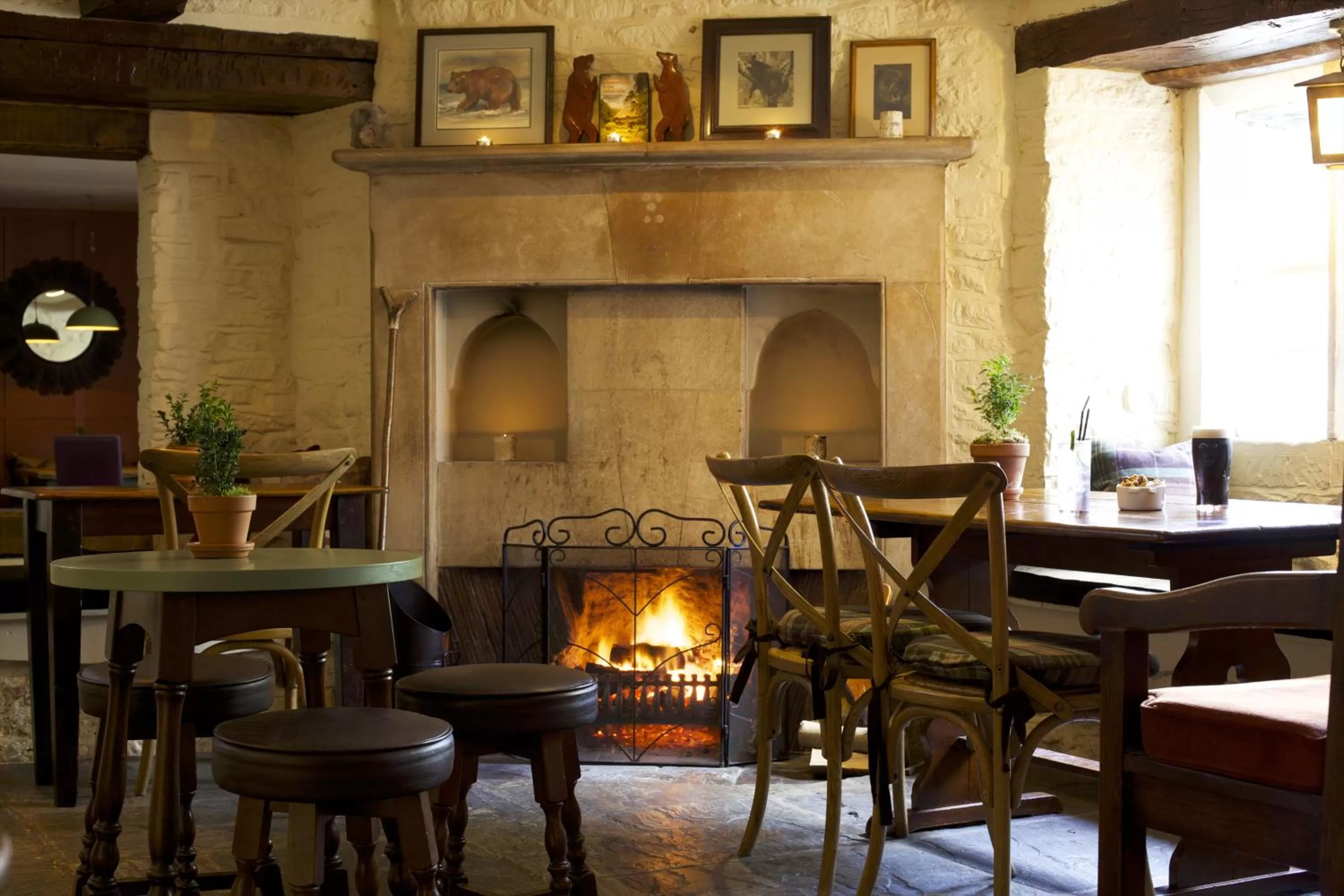 Communal lounge/ TV room in The Bear Of Rodborough Hotel