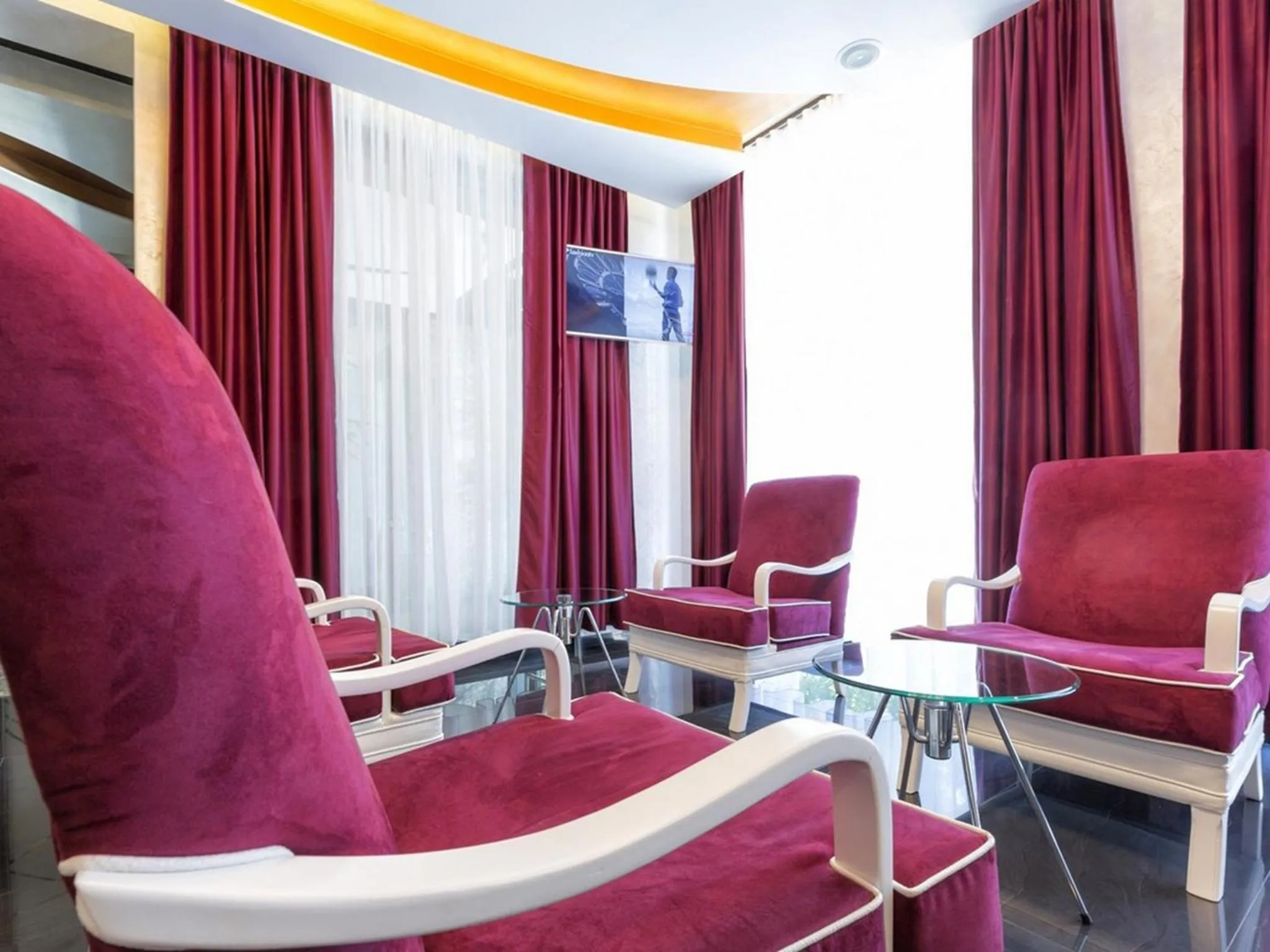 Communal lounge/ TV room in Nova City Garni Hotel Signature Collection