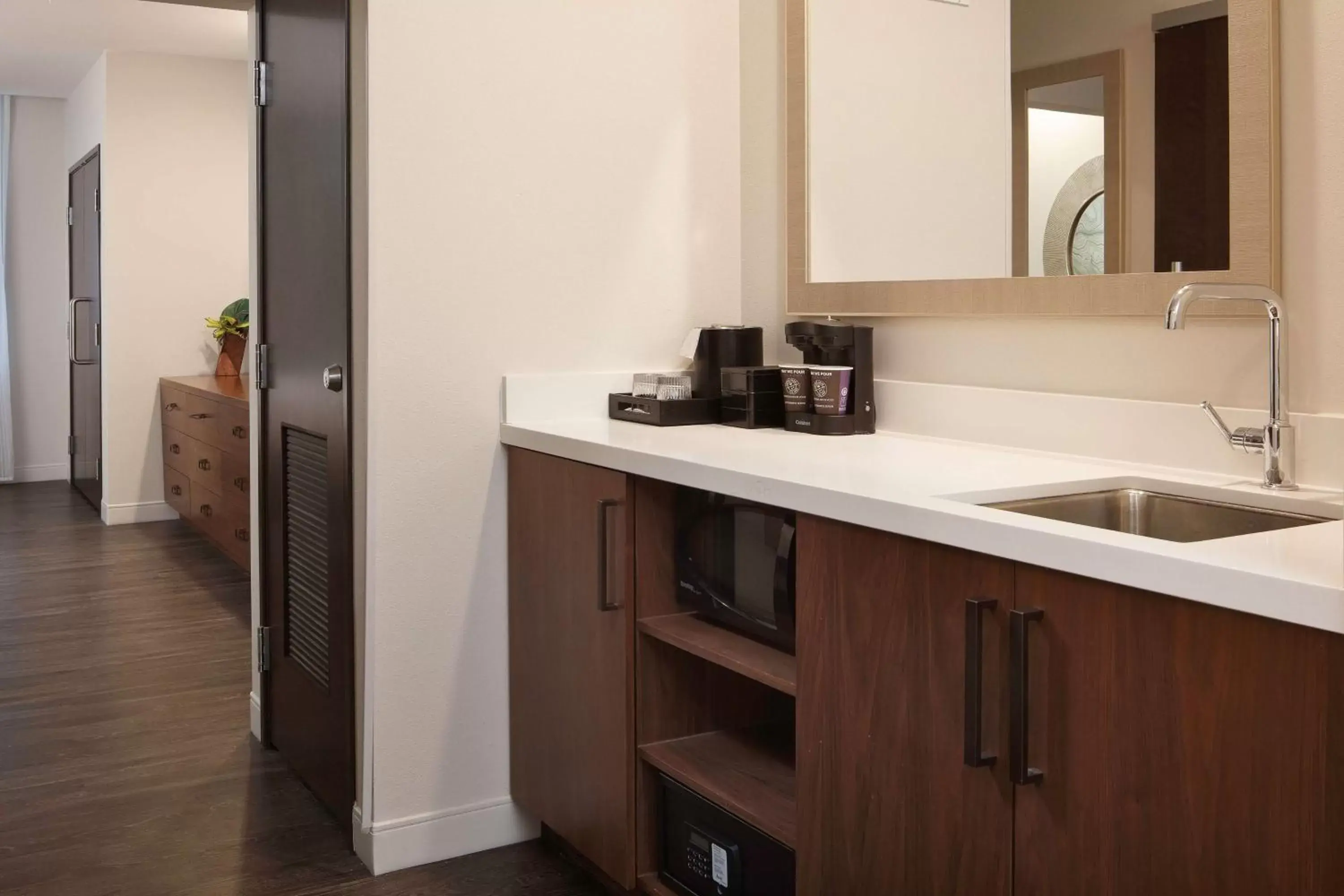 Bedroom, Kitchen/Kitchenette in Embassy Suites Amarillo Downtown