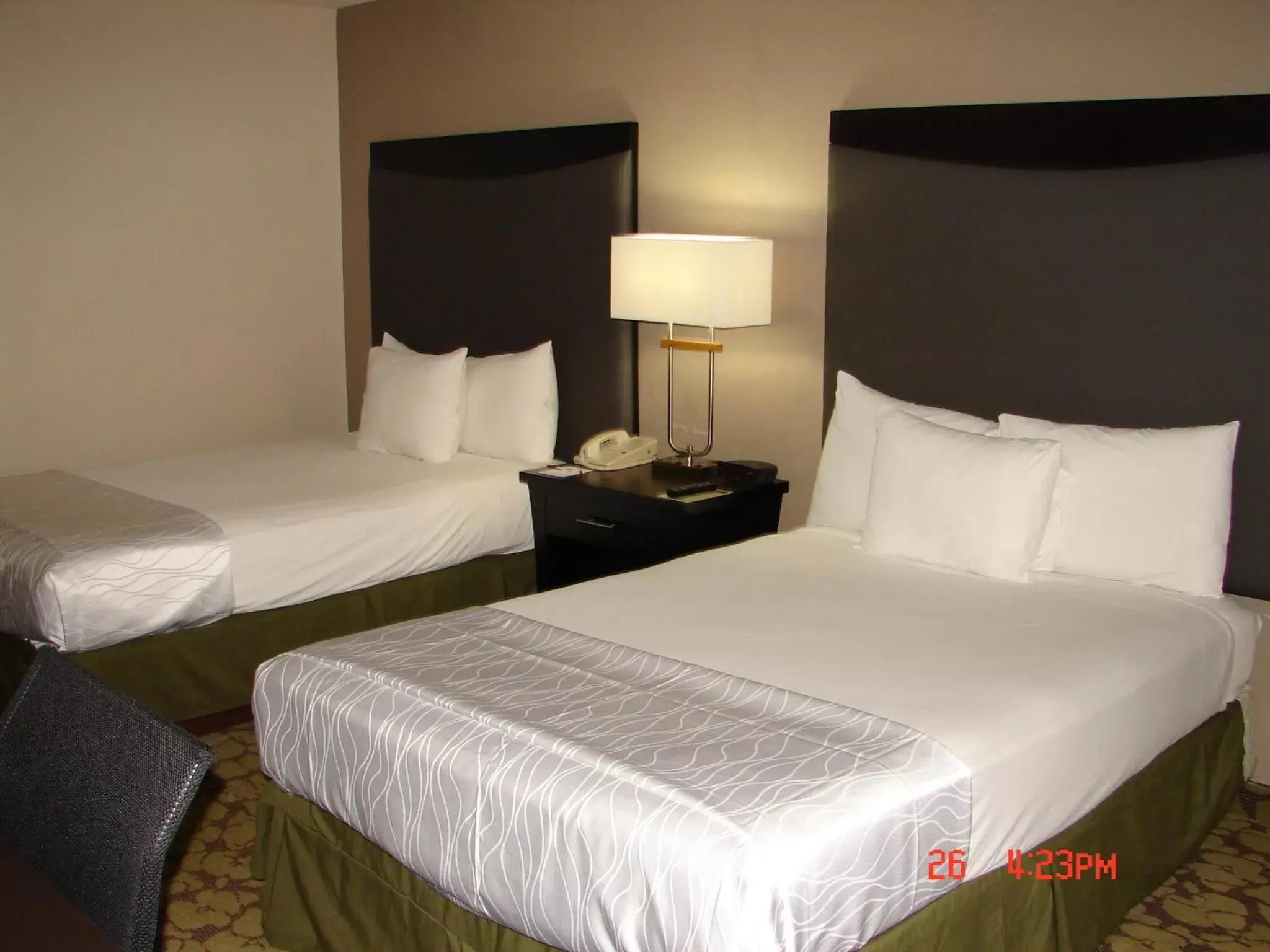 Bedroom, Bed in Ramada Plaza by Wyndham Charlotte South End Airport