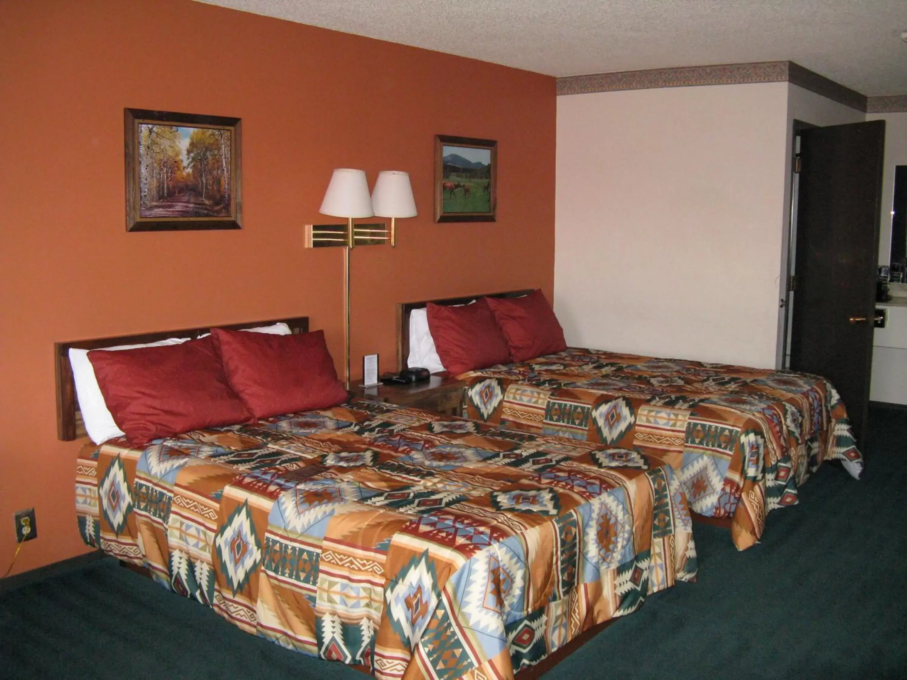 Photo of the whole room, Bed in Branding Iron Motel