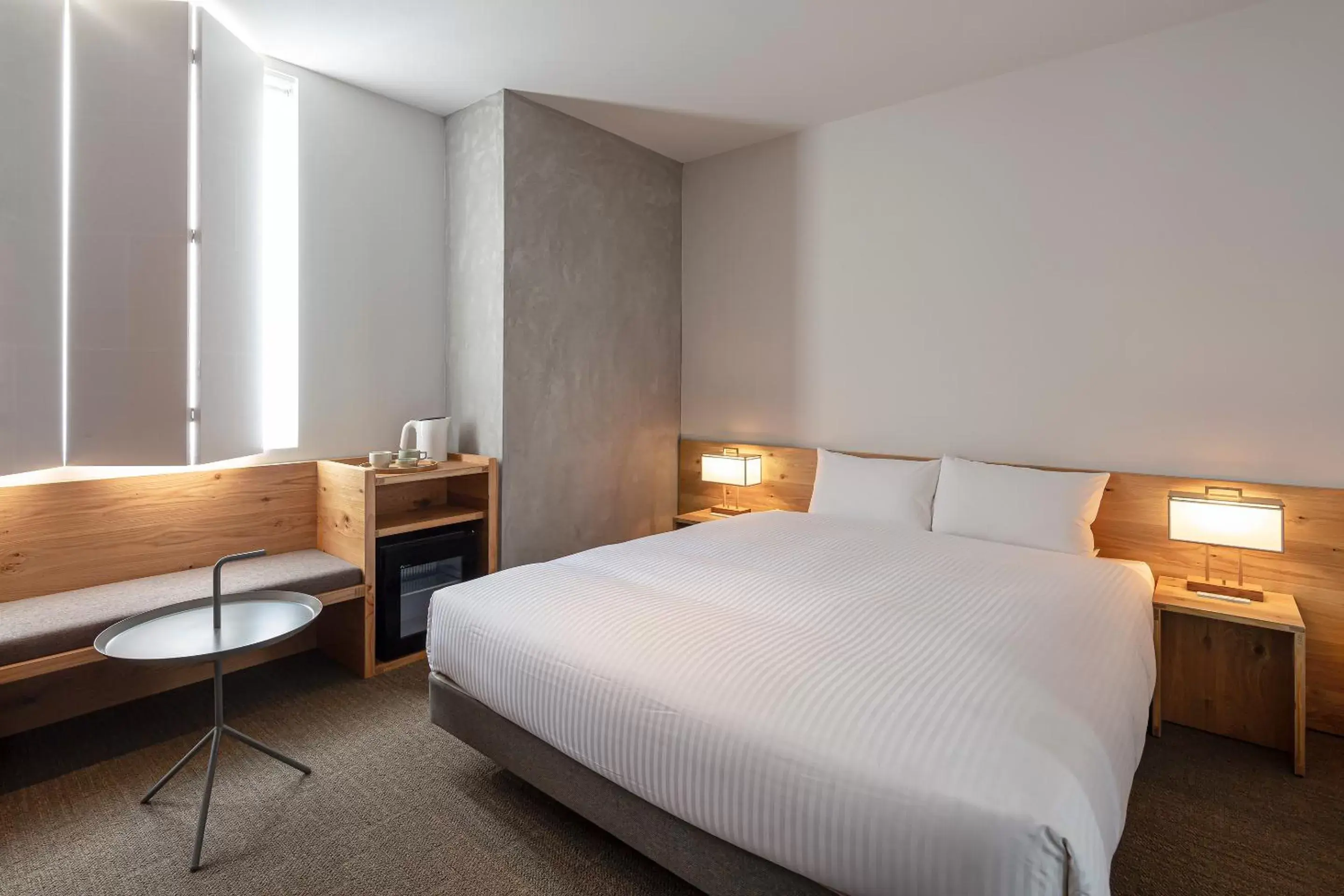 Photo of the whole room, Bed in TSUGU Kyoto Sanjo by THE SHARE HOTELS