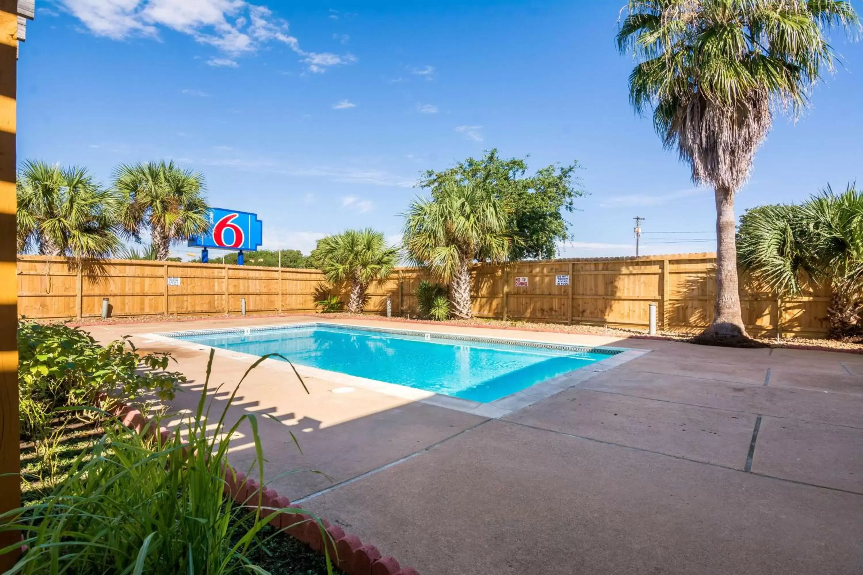 Day, Swimming Pool in Motel 6-Freeport, TX