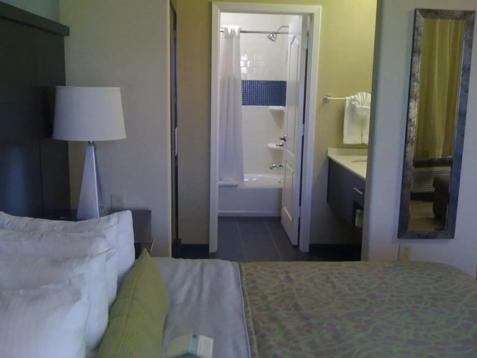 Decorative detail, Bed in Staybridge Suites Houston Stafford - Sugar Land, an IHG Hotel