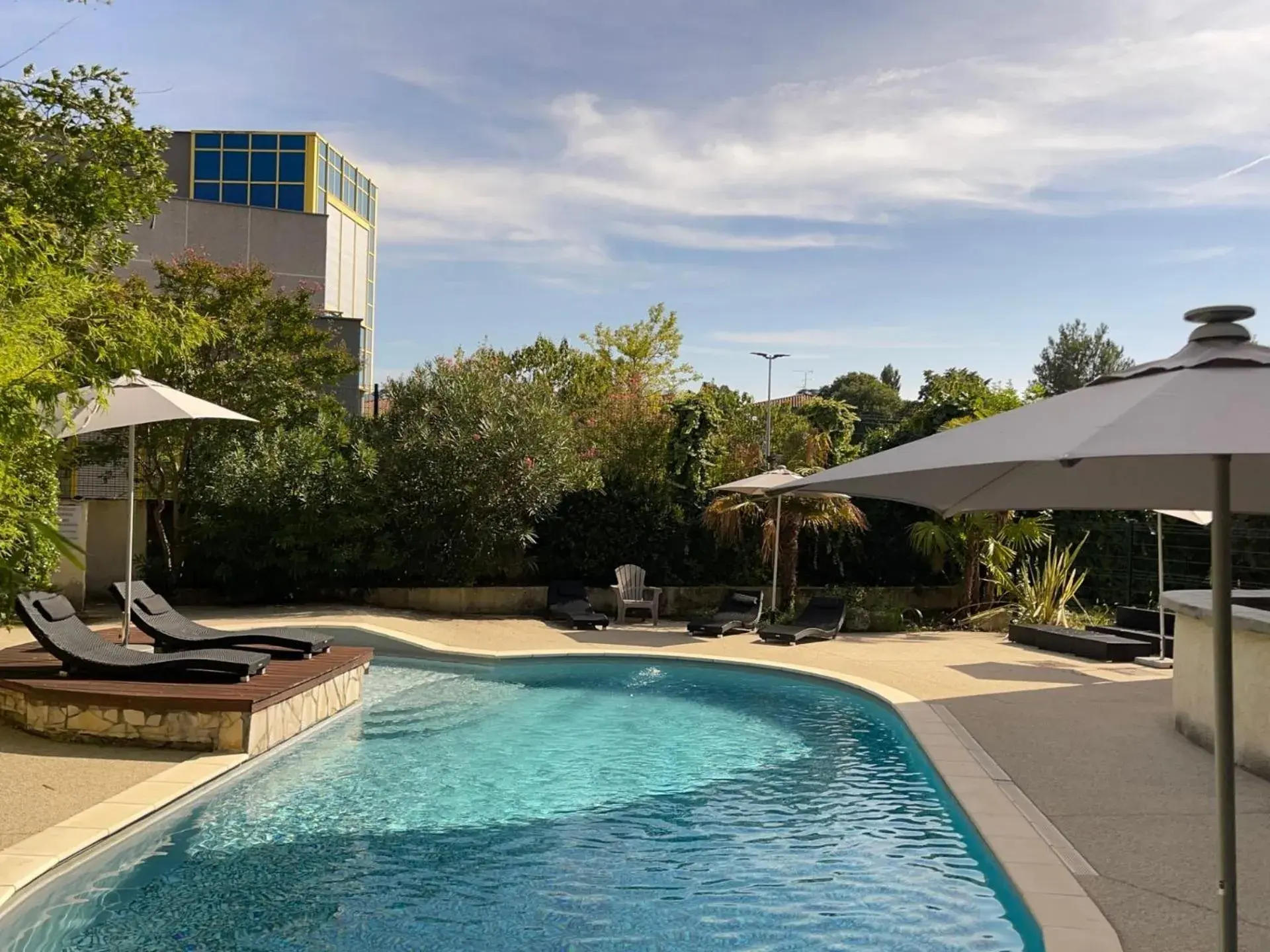 Patio, Swimming Pool in Hotel The Originals Romans-sur-Isère Le Clos des Tanneurs