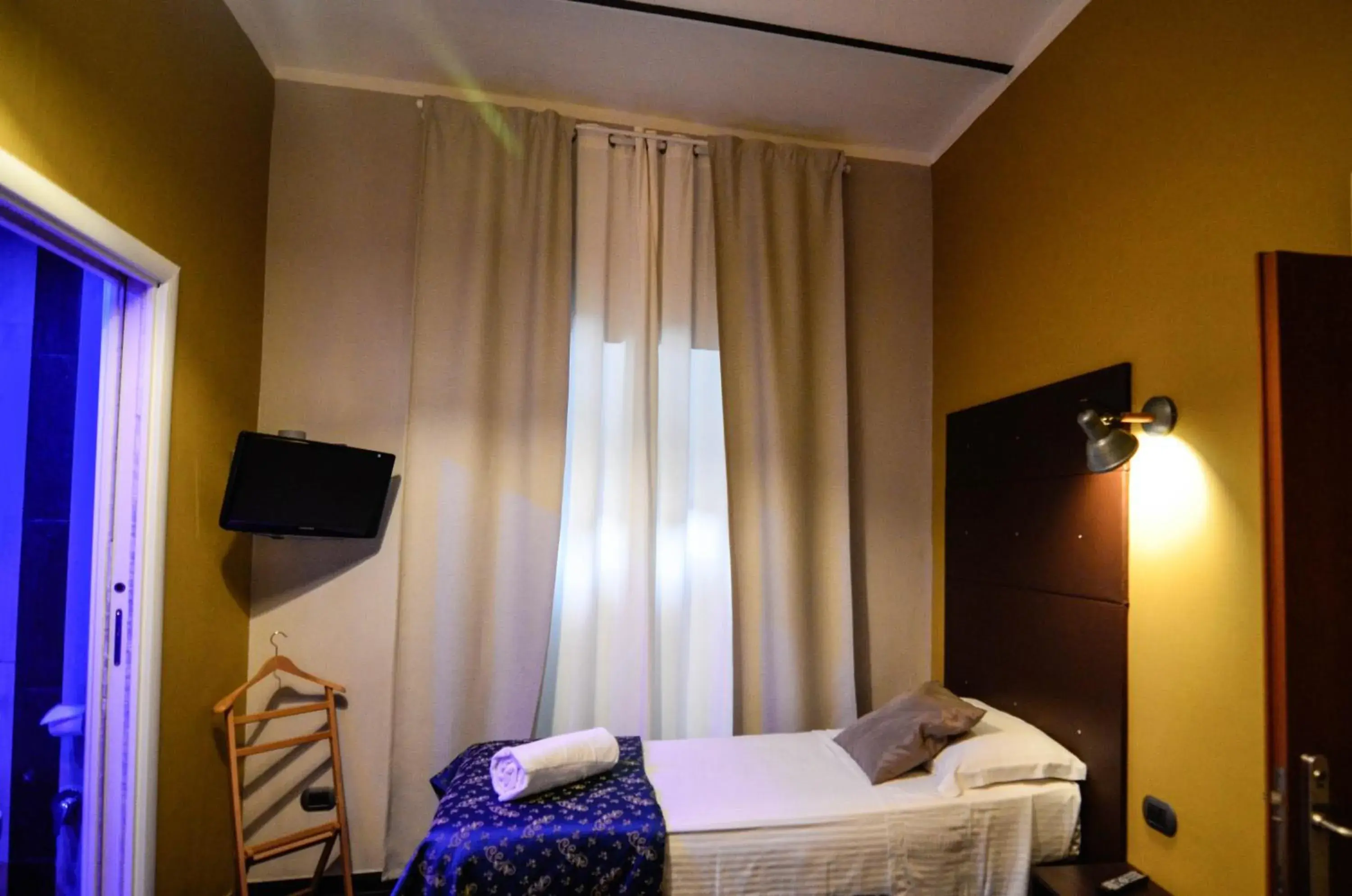 Bedroom, TV/Entertainment Center in Hotel Felice