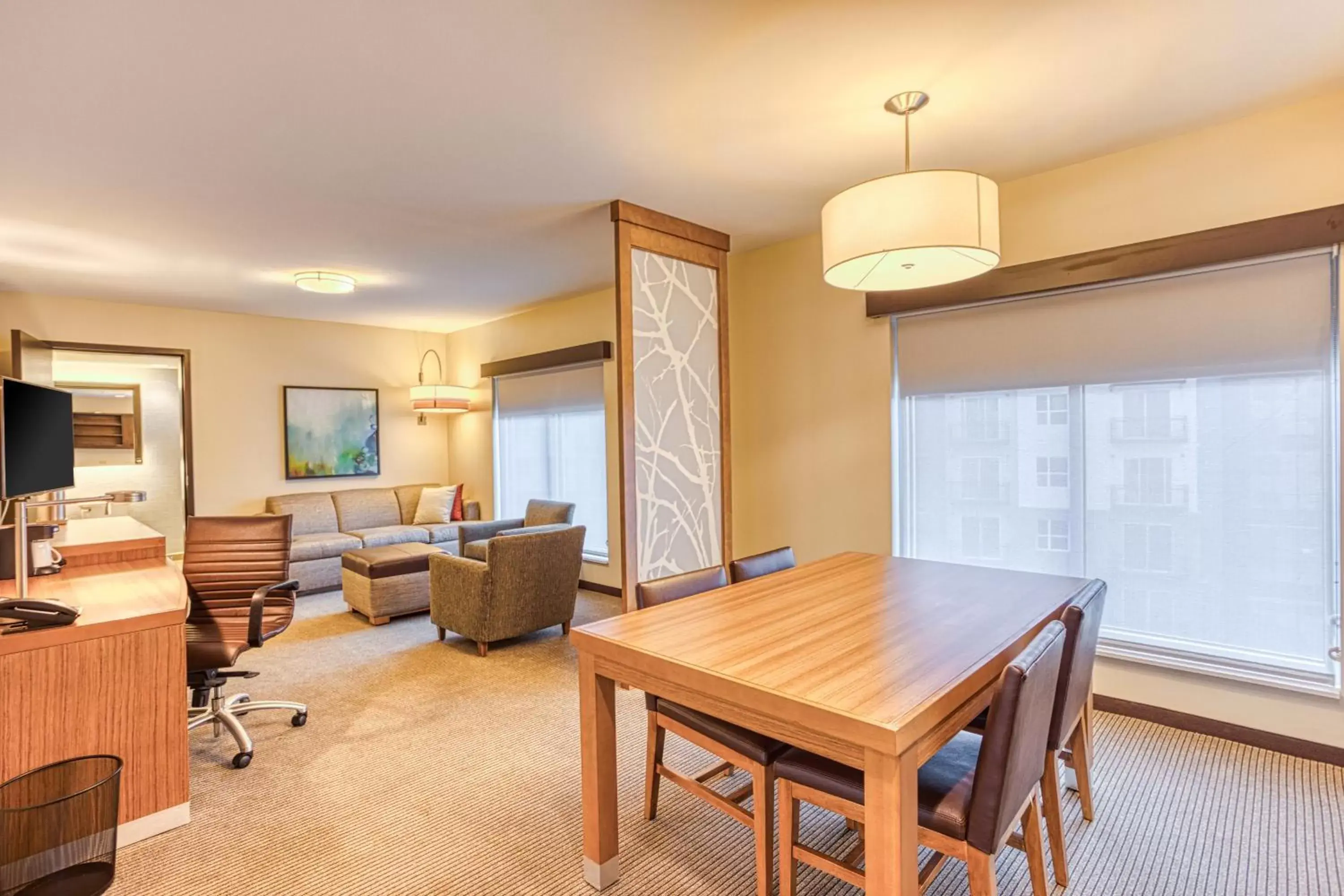 Living room, Dining Area in Hyatt Place Greensboro Downtown