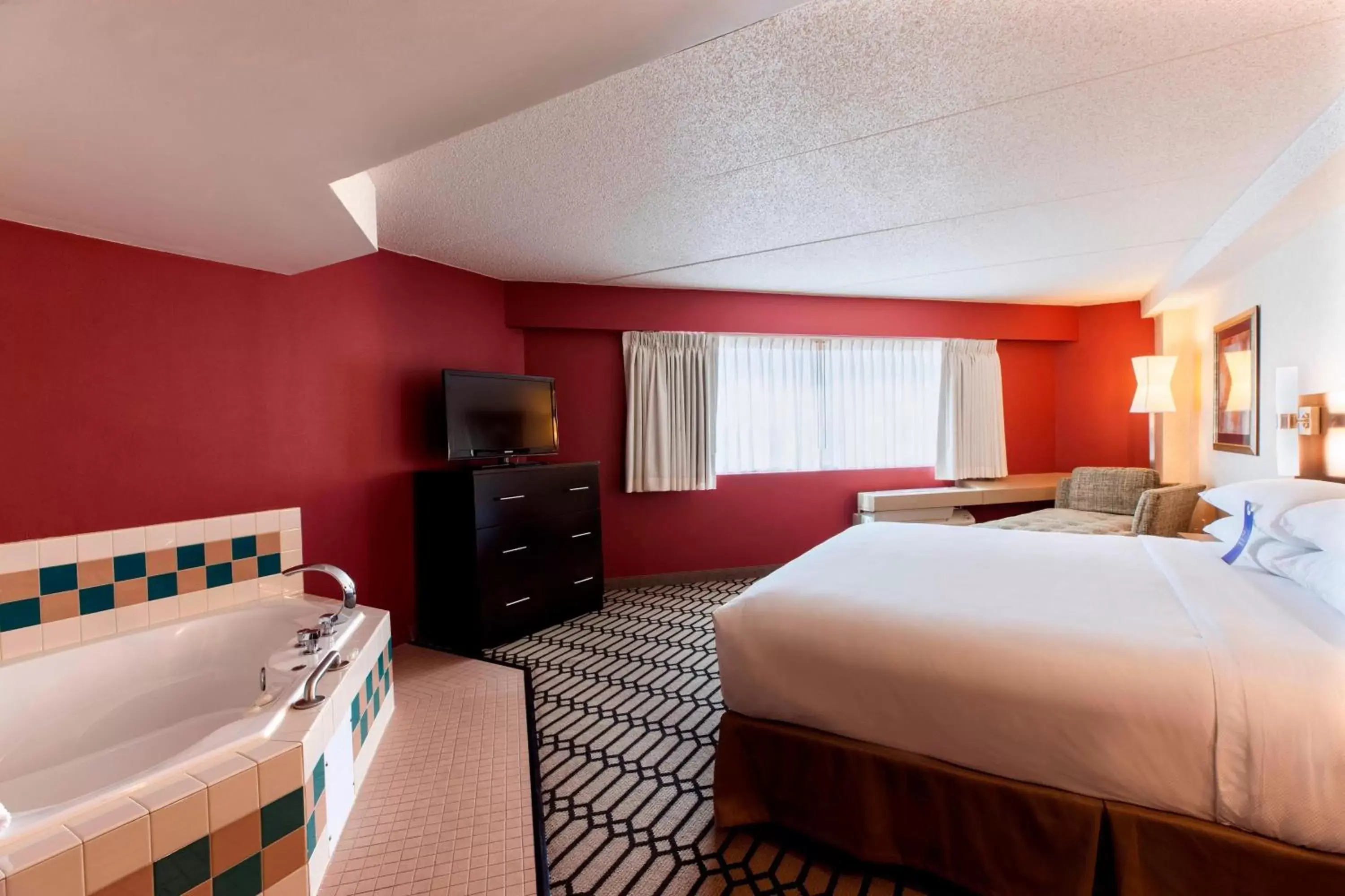 Bedroom in Delta Hotels by Marriott Fargo