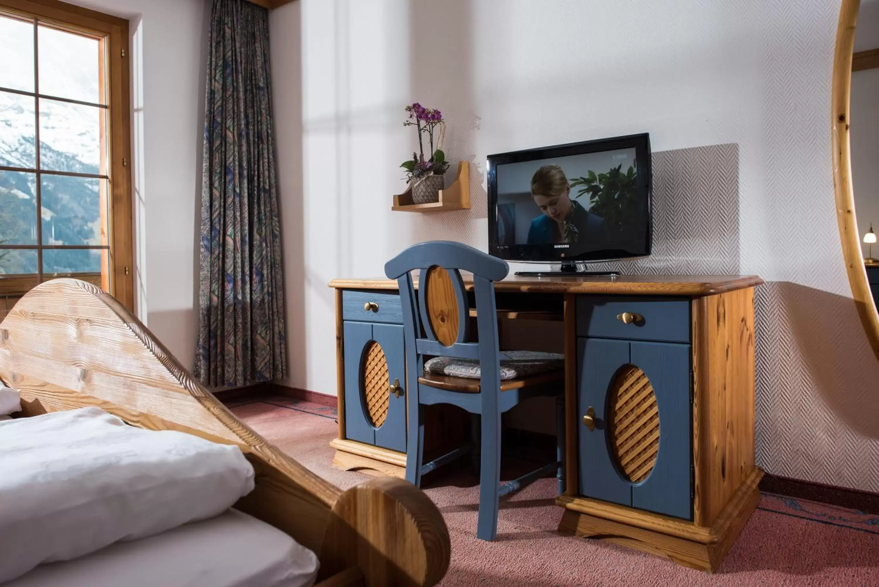 Photo of the whole room, TV/Entertainment Center in Hotel Bodmi