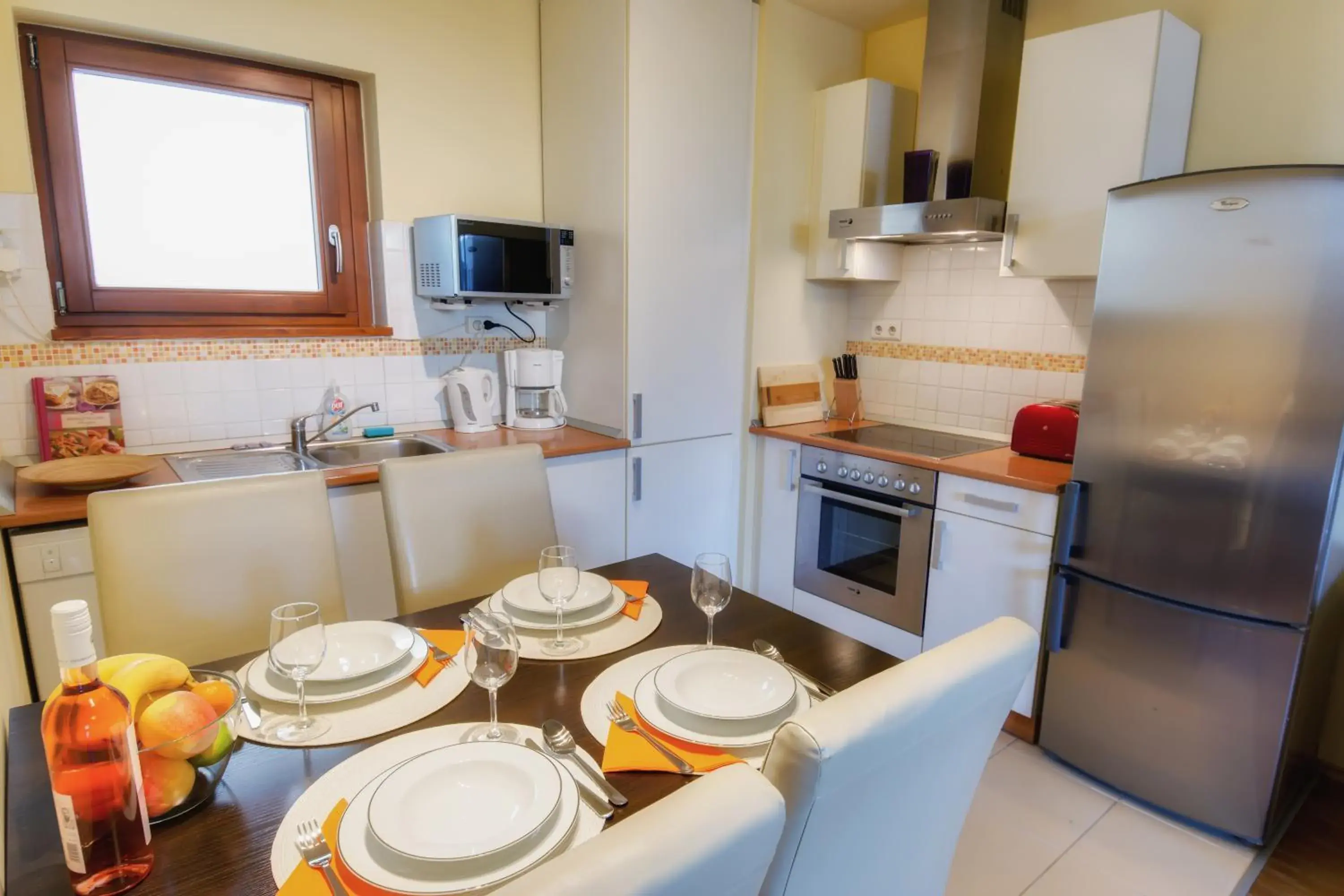 Dining area in Trendy Deluxe Apartments