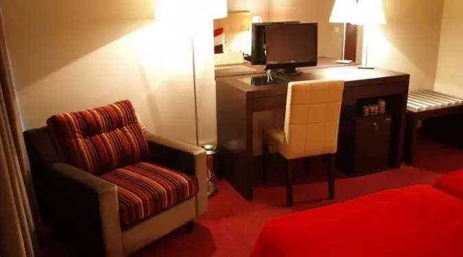 TV and multimedia, TV/Entertainment Center in Hotel Dighton