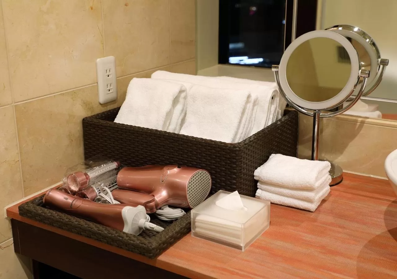 Bathroom in ANA Crowne Plaza Okayama by IHG