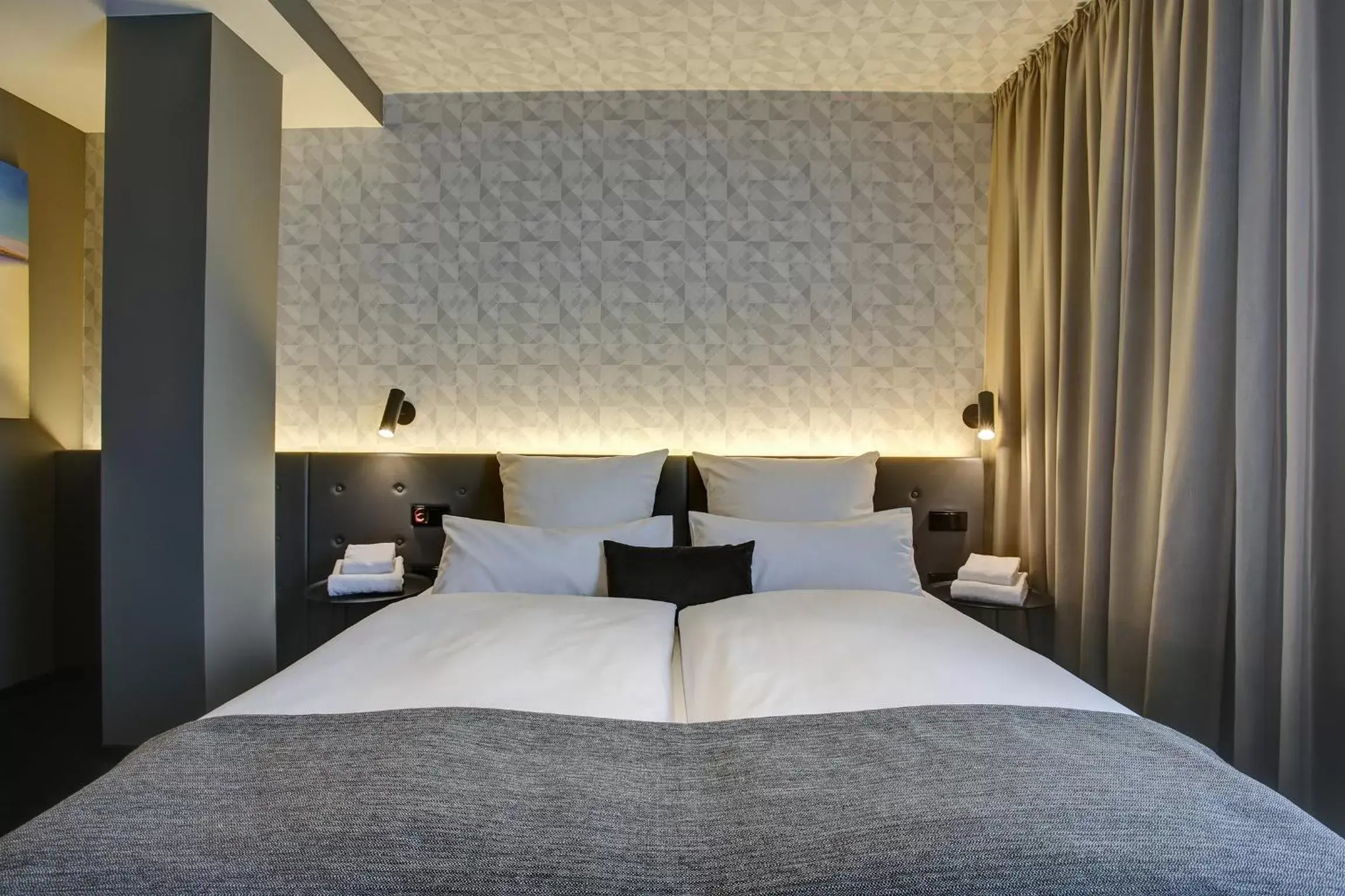 Photo of the whole room, Bed in NYCE Hotel Dortmund City