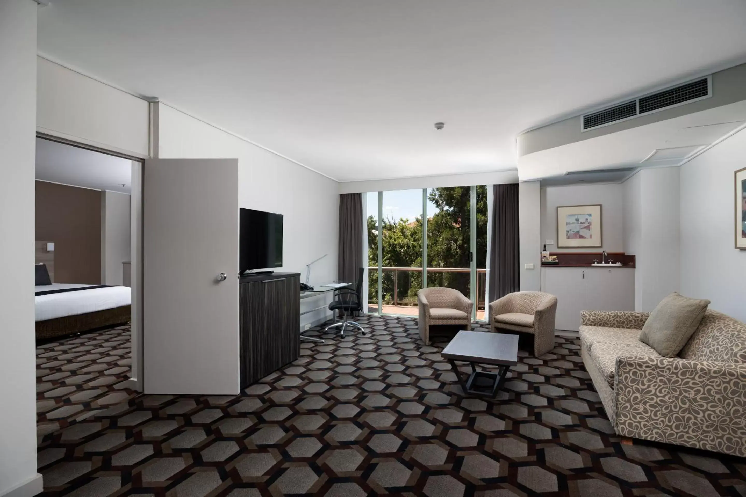 Living room, Seating Area in Rydges Canberra