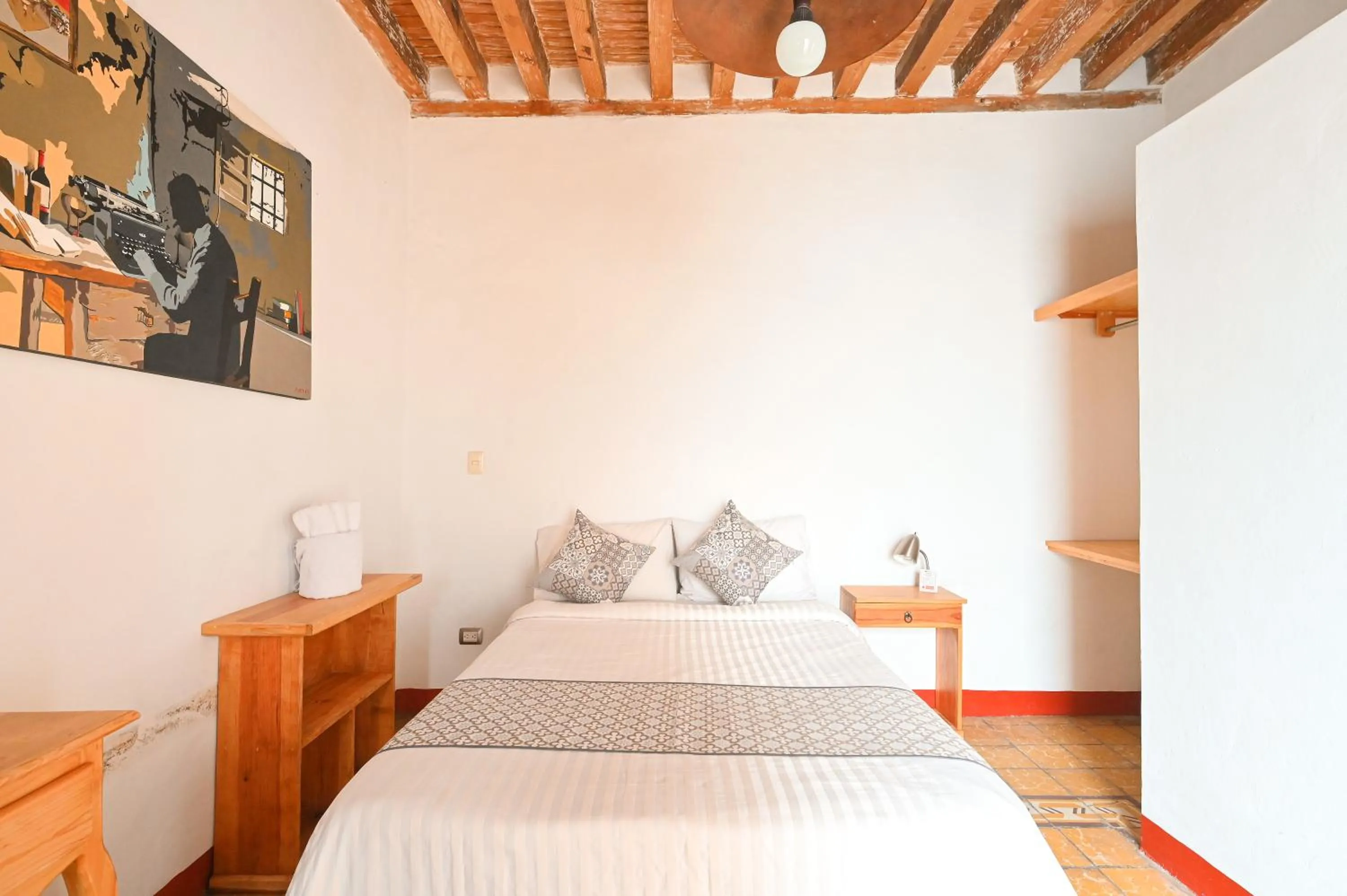 Bed in Hotel Meson Cuevano