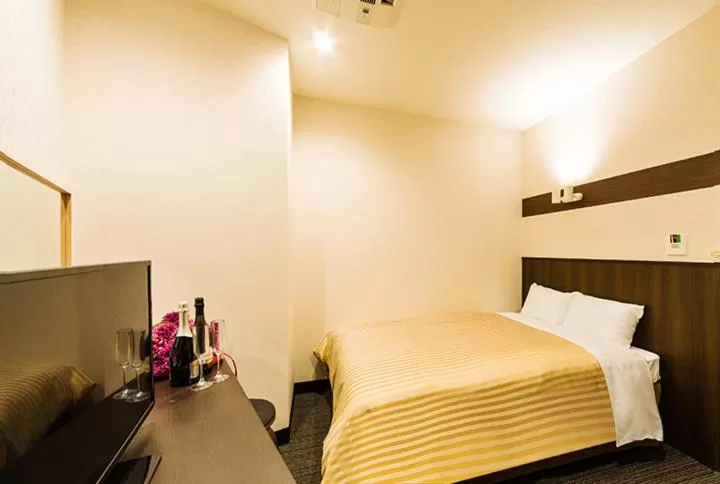 Bed in Hotel CASVI Tenjin