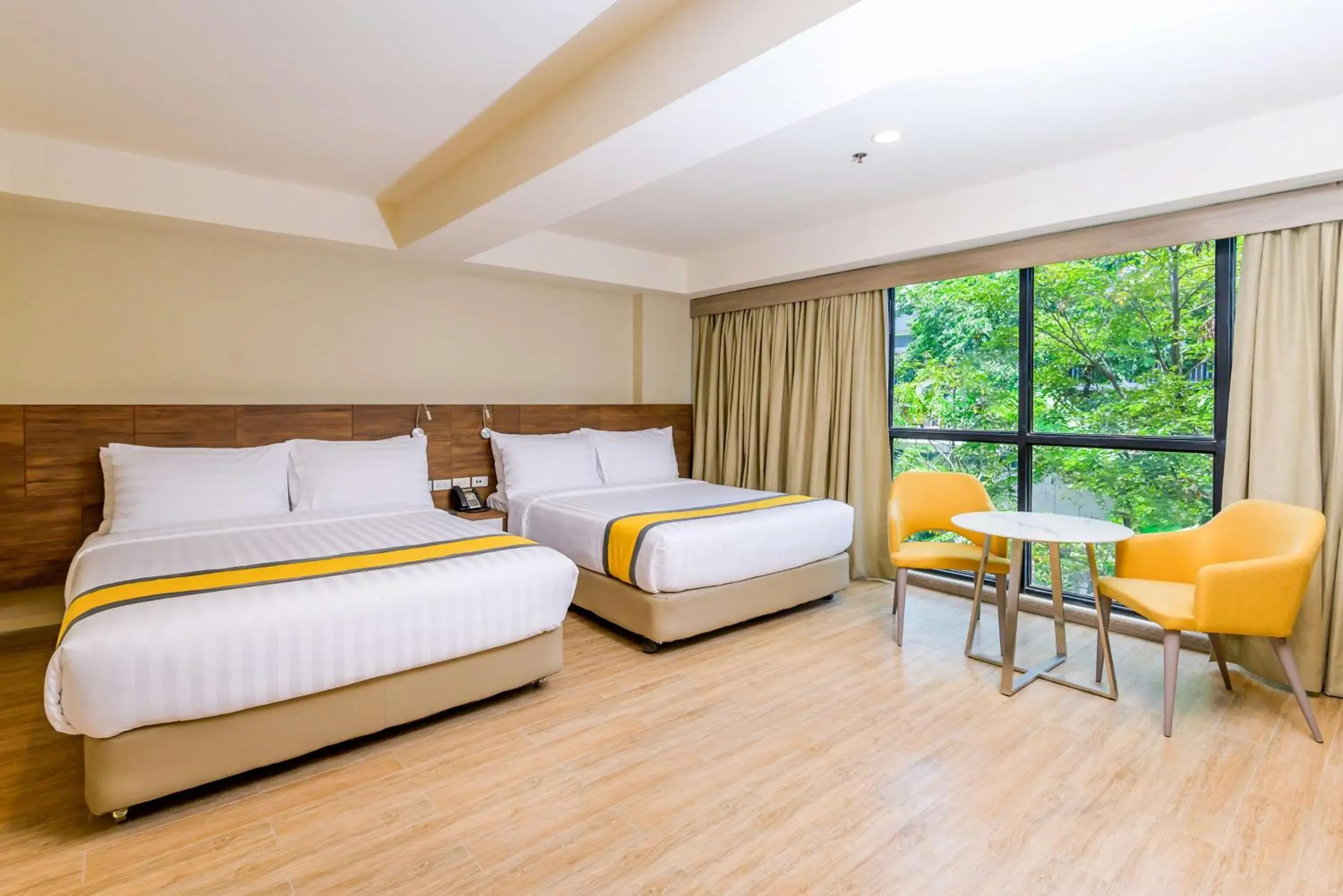 Photo of the whole room, Bed in SureStay Plus by Best Western Cebu City