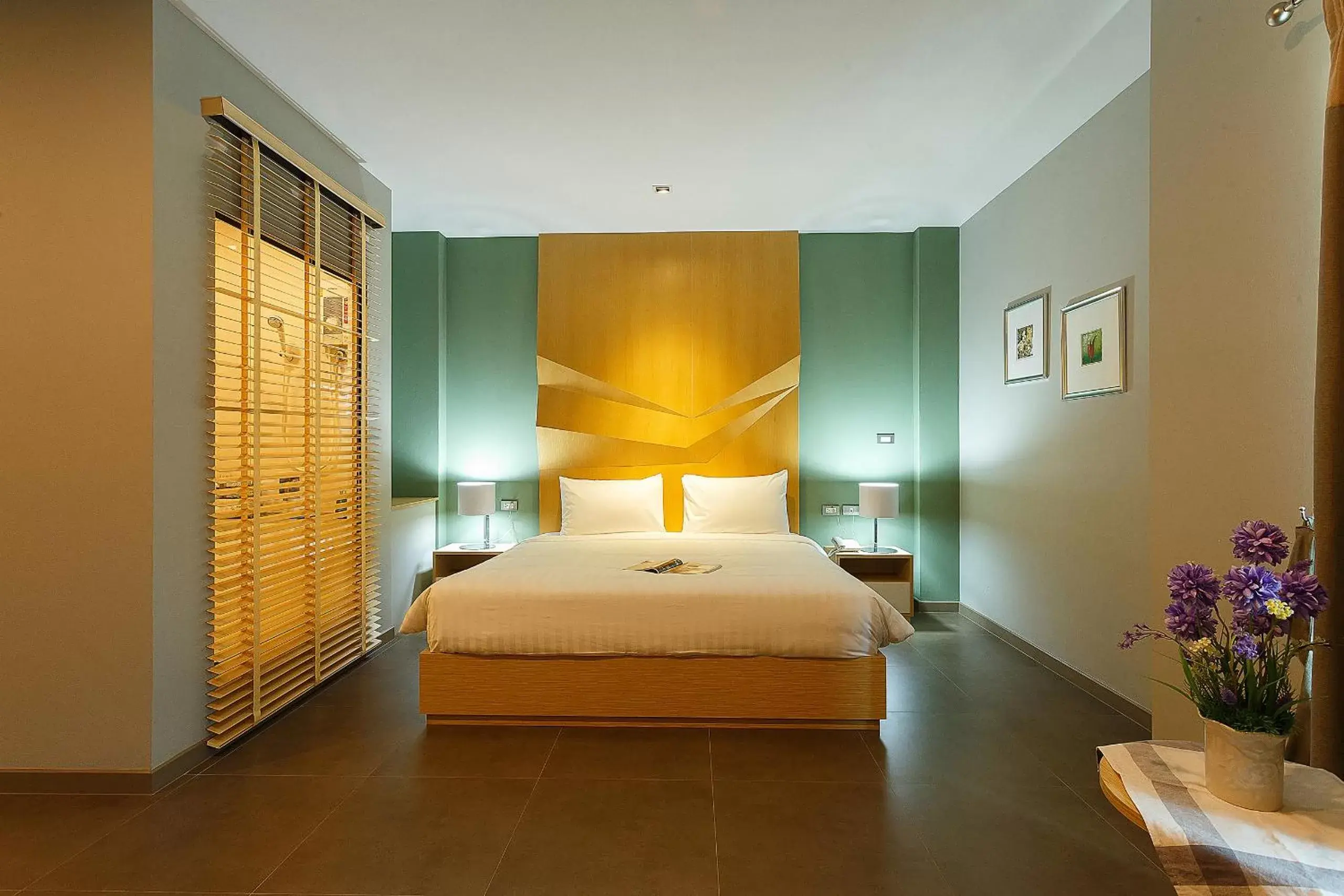 Bed in Green Point Residence Hotel