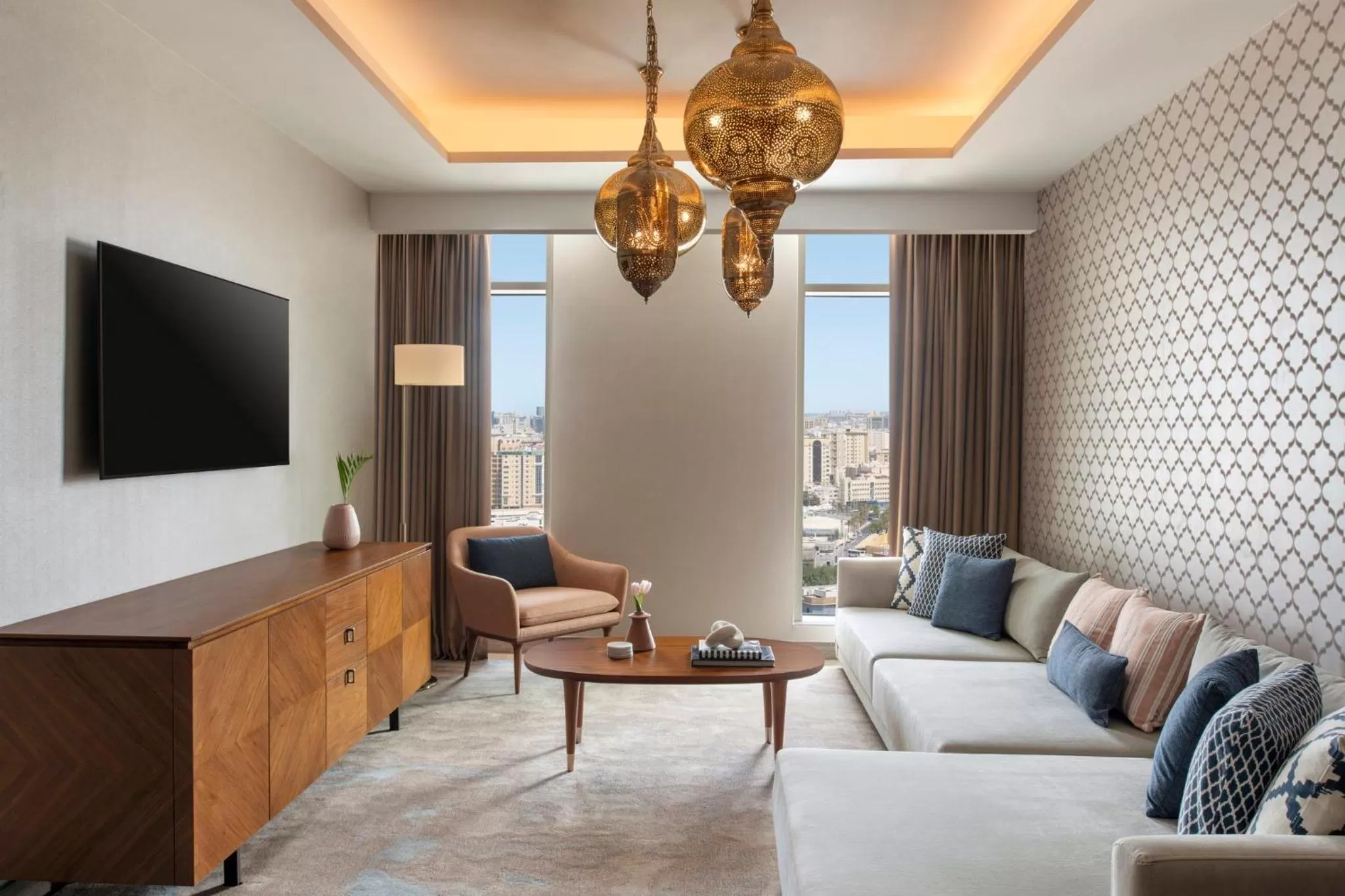Living room in Abesq Doha Hotel and Residences, an IHG Hotel